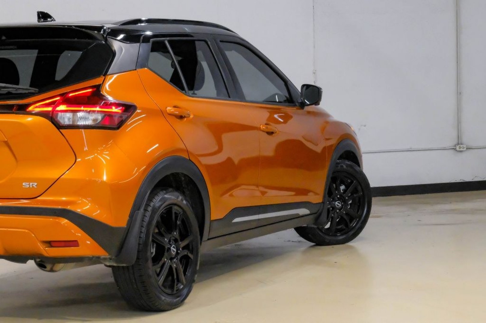 2023 Orange Metallic /Charcoal Nissan Kicks SR (3N1CP5DVXPL) with an 1.6L 4-Cylinder DOHC 16V engine, CVT transmission, located at 15300 Midway Rd., Addison, TX, 75001, (972) 702-0011, 32.958321, -96.838074- Photo#11
