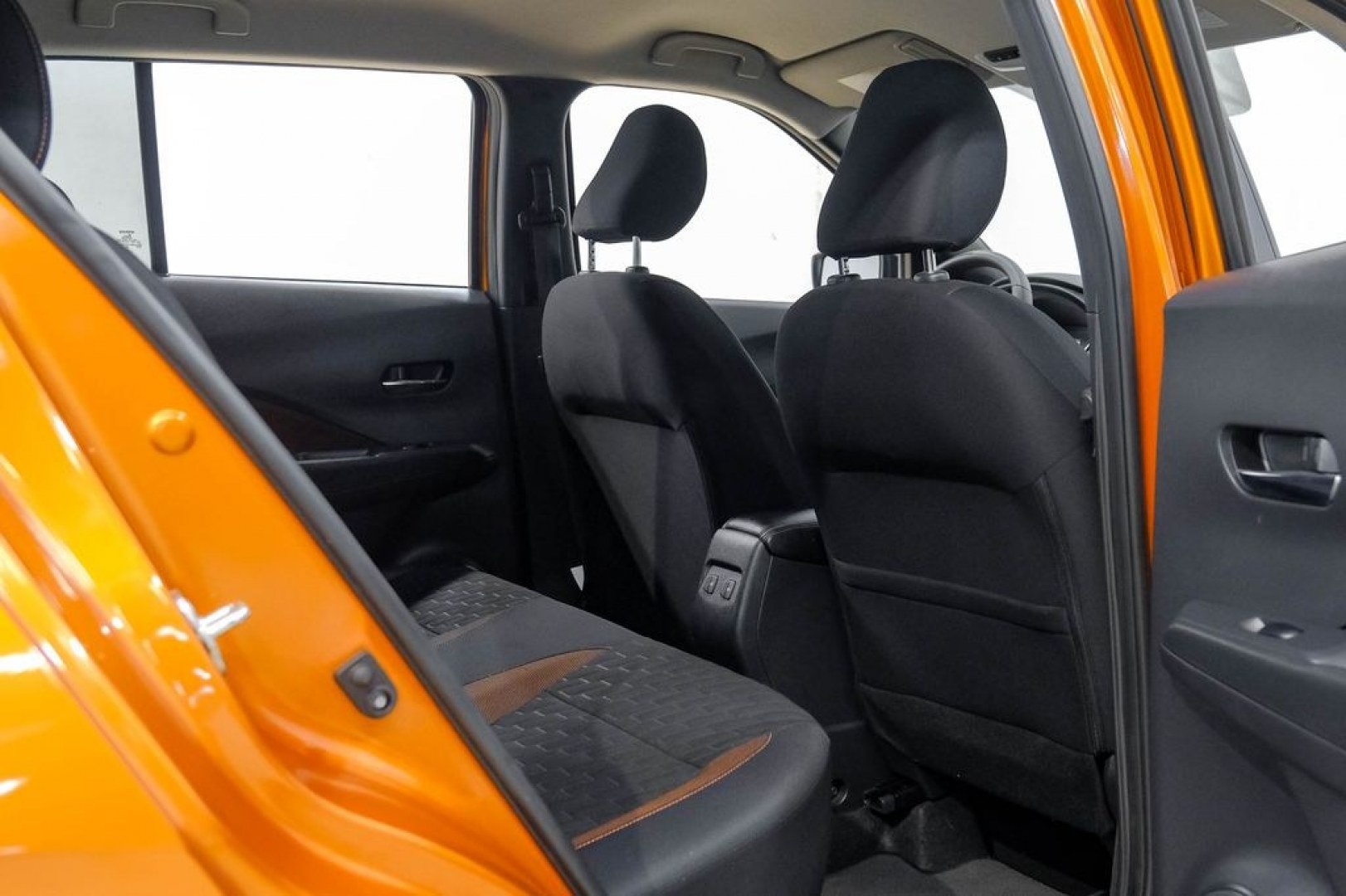 2023 Orange Metallic /Charcoal Nissan Kicks SR (3N1CP5DVXPL) with an 1.6L 4-Cylinder DOHC 16V engine, CVT transmission, located at 15300 Midway Rd., Addison, TX, 75001, (972) 702-0011, 32.958321, -96.838074- Photo#46
