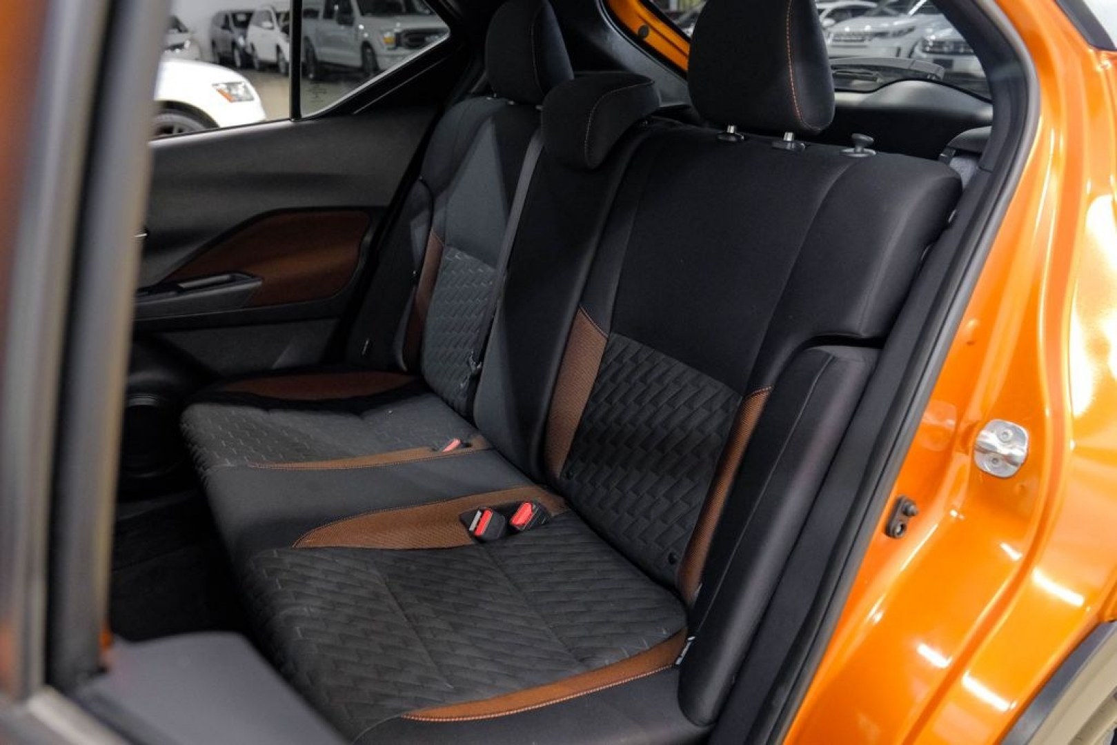 2023 Orange Metallic /Charcoal Nissan Kicks SR (3N1CP5DVXPL) with an 1.6L 4-Cylinder DOHC 16V engine, CVT transmission, located at 15300 Midway Rd., Addison, TX, 75001, (972) 702-0011, 32.958321, -96.838074- Photo#49