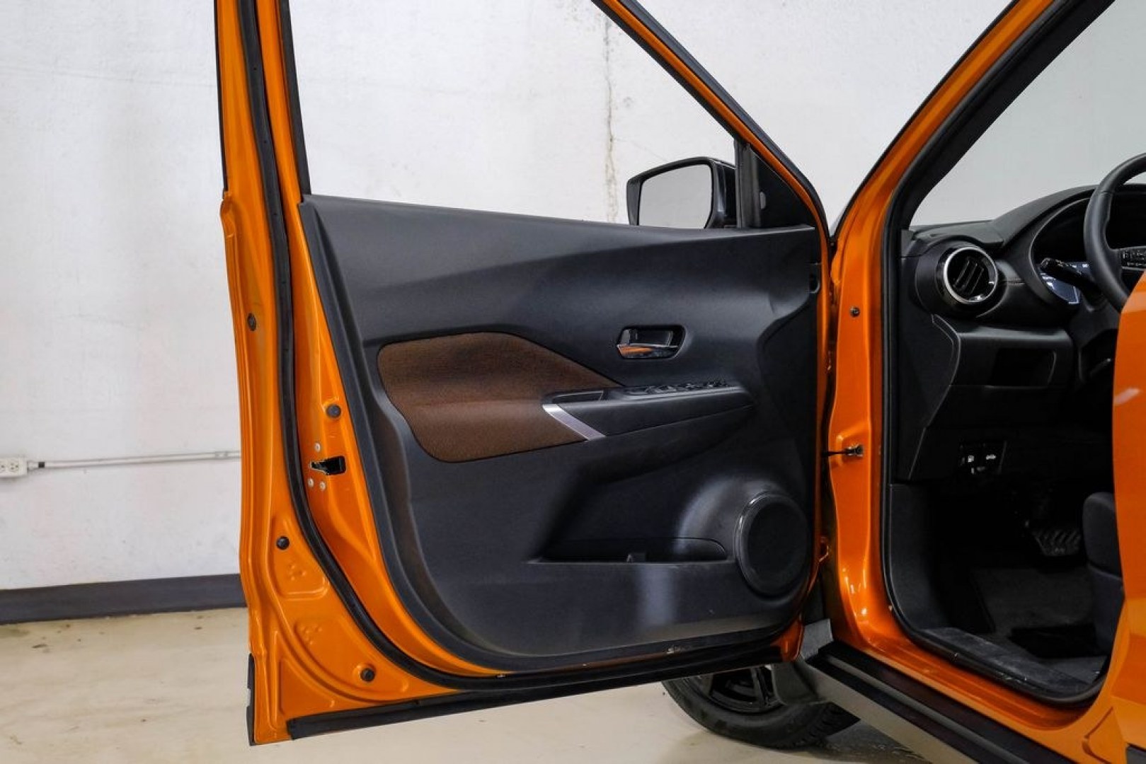 2023 Orange Metallic /Charcoal Nissan Kicks SR (3N1CP5DVXPL) with an 1.6L 4-Cylinder DOHC 16V engine, CVT transmission, located at 15300 Midway Rd., Addison, TX, 75001, (972) 702-0011, 32.958321, -96.838074- Photo#52