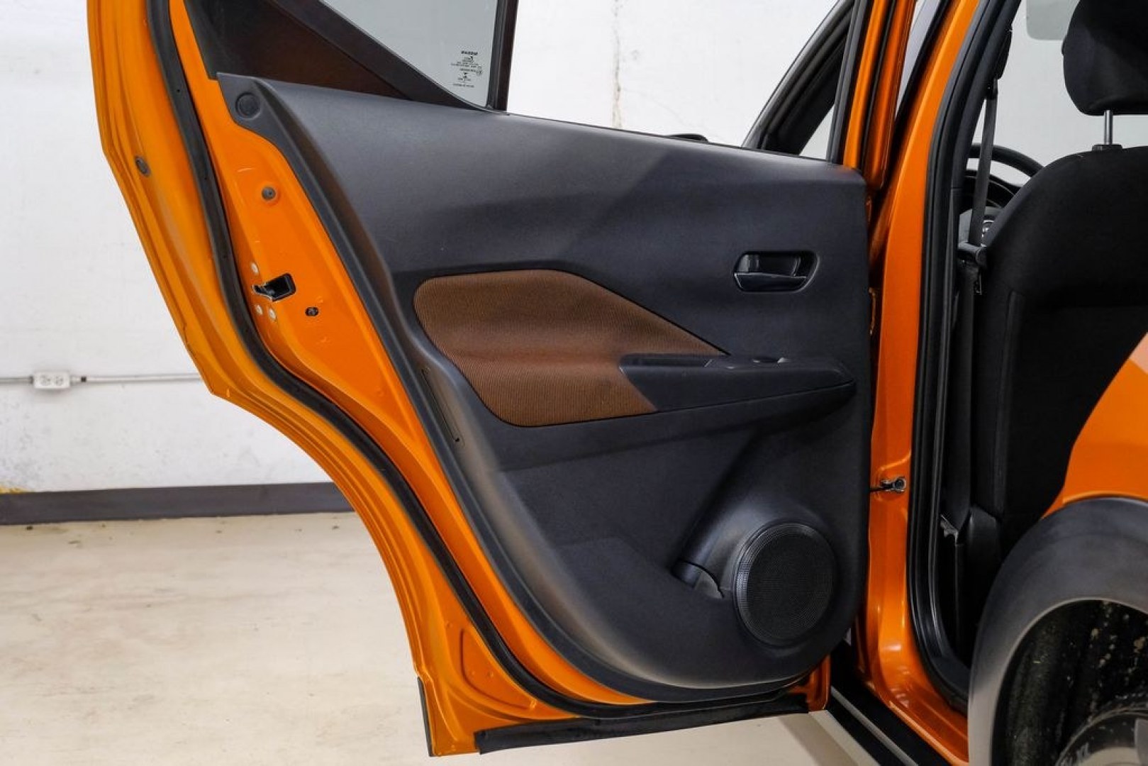 2023 Orange Metallic /Charcoal Nissan Kicks SR (3N1CP5DVXPL) with an 1.6L 4-Cylinder DOHC 16V engine, CVT transmission, located at 15300 Midway Rd., Addison, TX, 75001, (972) 702-0011, 32.958321, -96.838074- Photo#55