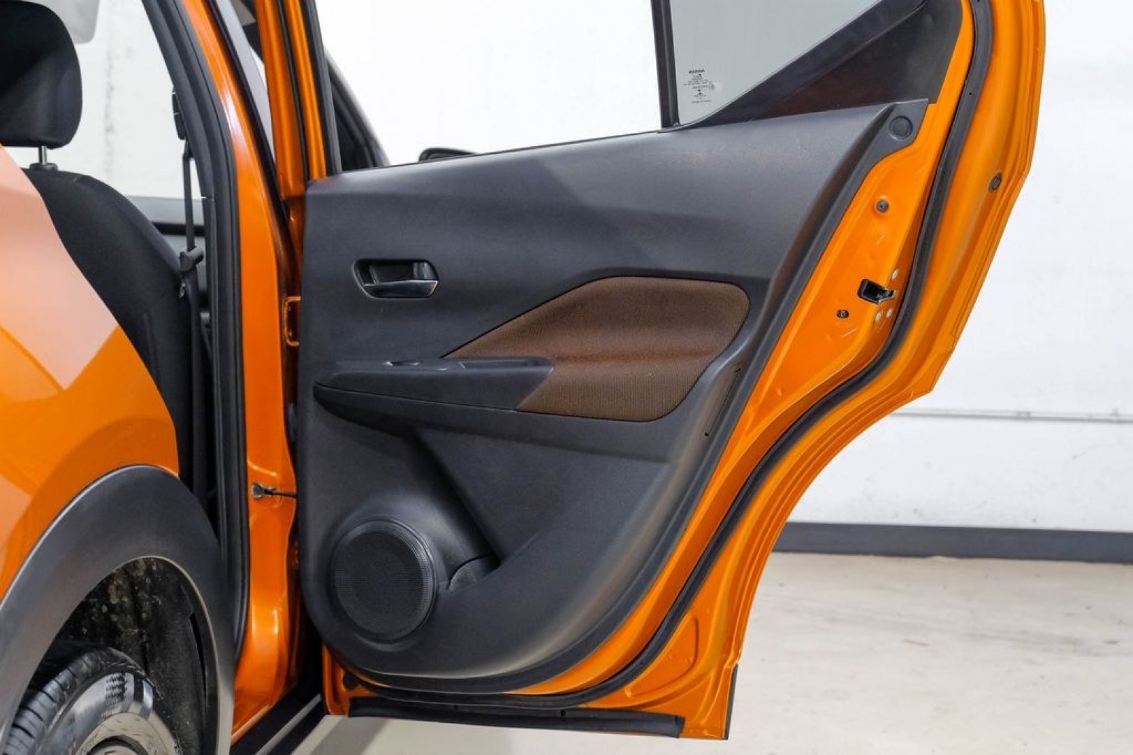 2023 Orange Metallic /Charcoal Nissan Kicks SR (3N1CP5DVXPL) with an 1.6L 4-Cylinder DOHC 16V engine, CVT transmission, located at 15300 Midway Rd., Addison, TX, 75001, (972) 702-0011, 32.958321, -96.838074- Photo#56