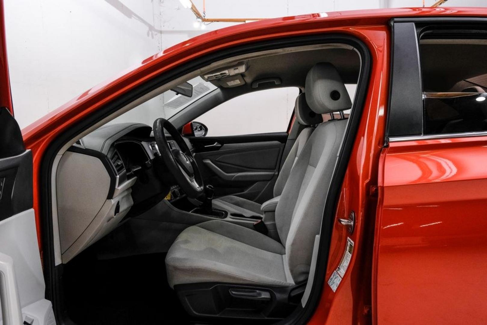 2019 Habanero Orange Metallic /Dark Beige Volkswagen Jetta 1.4T S (3VWN57BU9KM) with an 1.4L TSI engine, Manual transmission, located at 15300 Midway Rd., Addison, TX, 75001, (972) 702-0011, 32.958321, -96.838074- Photo#3