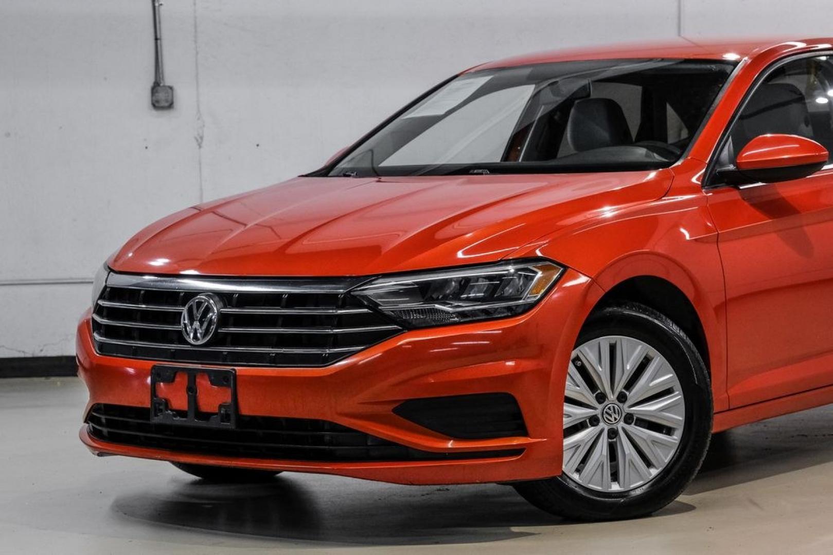 2019 Habanero Orange Metallic /Dark Beige Volkswagen Jetta 1.4T S (3VWN57BU9KM) with an 1.4L TSI engine, Manual transmission, located at 15300 Midway Rd., Addison, TX, 75001, (972) 702-0011, 32.958321, -96.838074- Photo#4