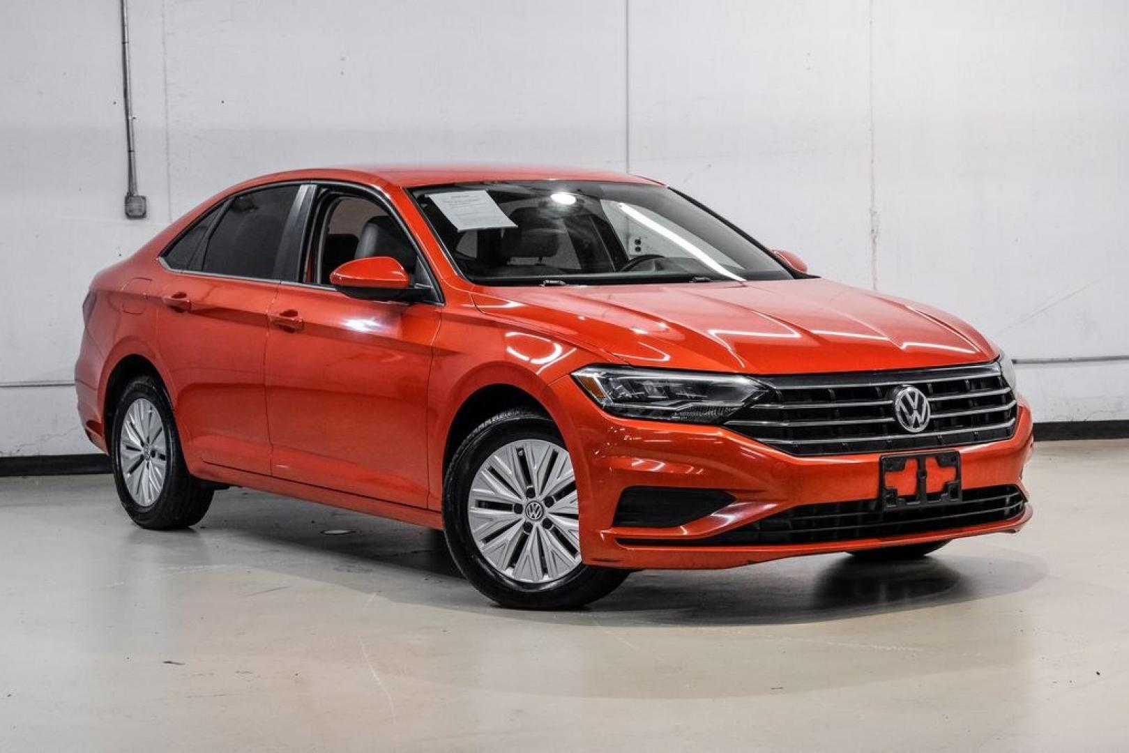 2019 Habanero Orange Metallic /Dark Beige Volkswagen Jetta 1.4T S (3VWN57BU9KM) with an 1.4L TSI engine, Manual transmission, located at 15300 Midway Rd., Addison, TX, 75001, (972) 702-0011, 32.958321, -96.838074- Photo#7