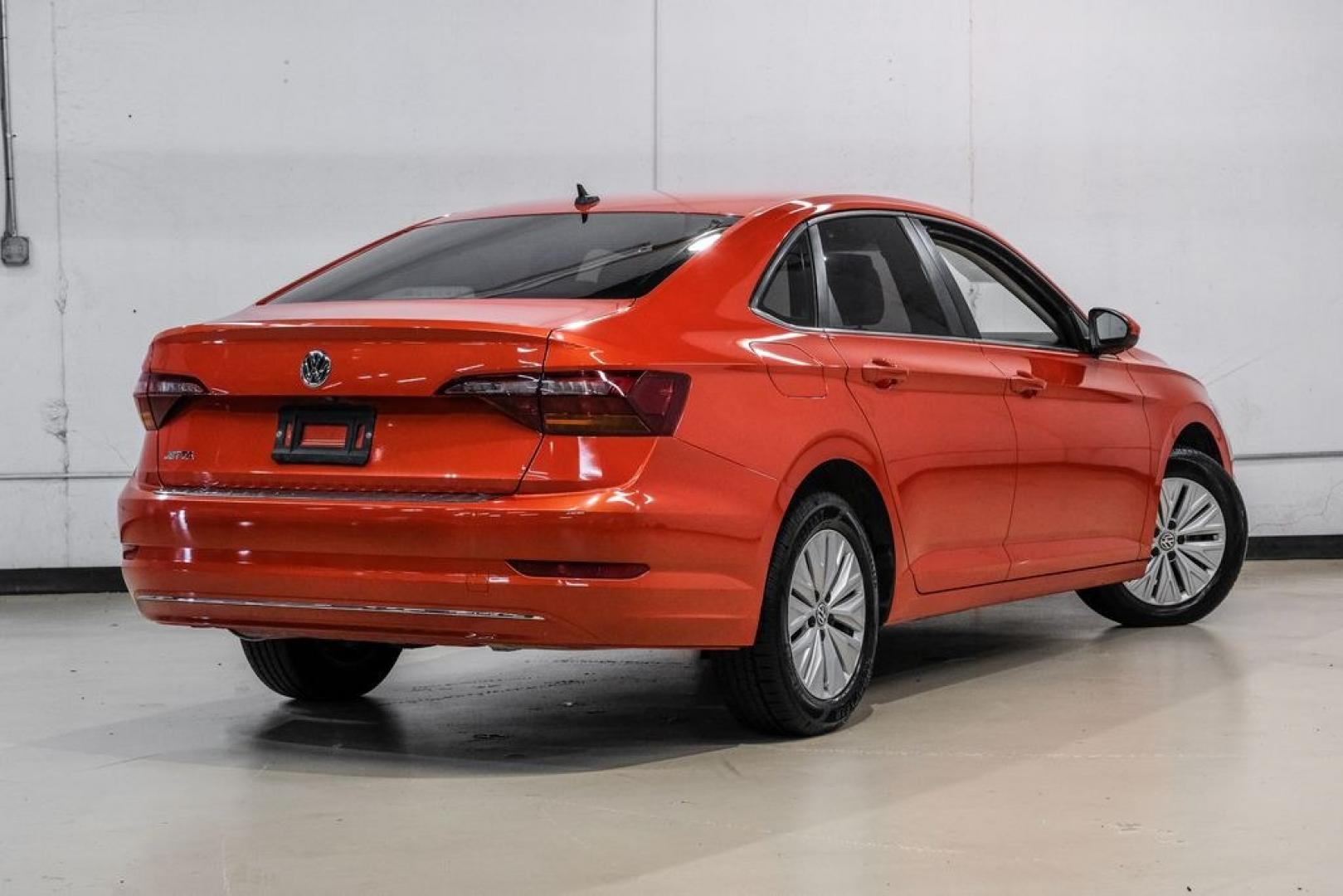 2019 Habanero Orange Metallic /Dark Beige Volkswagen Jetta 1.4T S (3VWN57BU9KM) with an 1.4L TSI engine, Manual transmission, located at 15300 Midway Rd., Addison, TX, 75001, (972) 702-0011, 32.958321, -96.838074- Photo#9