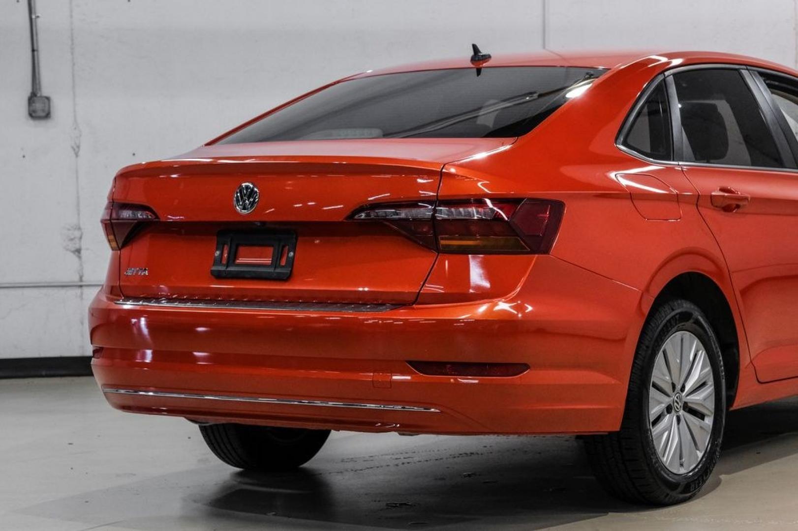 2019 Habanero Orange Metallic /Dark Beige Volkswagen Jetta 1.4T S (3VWN57BU9KM) with an 1.4L TSI engine, Manual transmission, located at 15300 Midway Rd., Addison, TX, 75001, (972) 702-0011, 32.958321, -96.838074- Photo#10