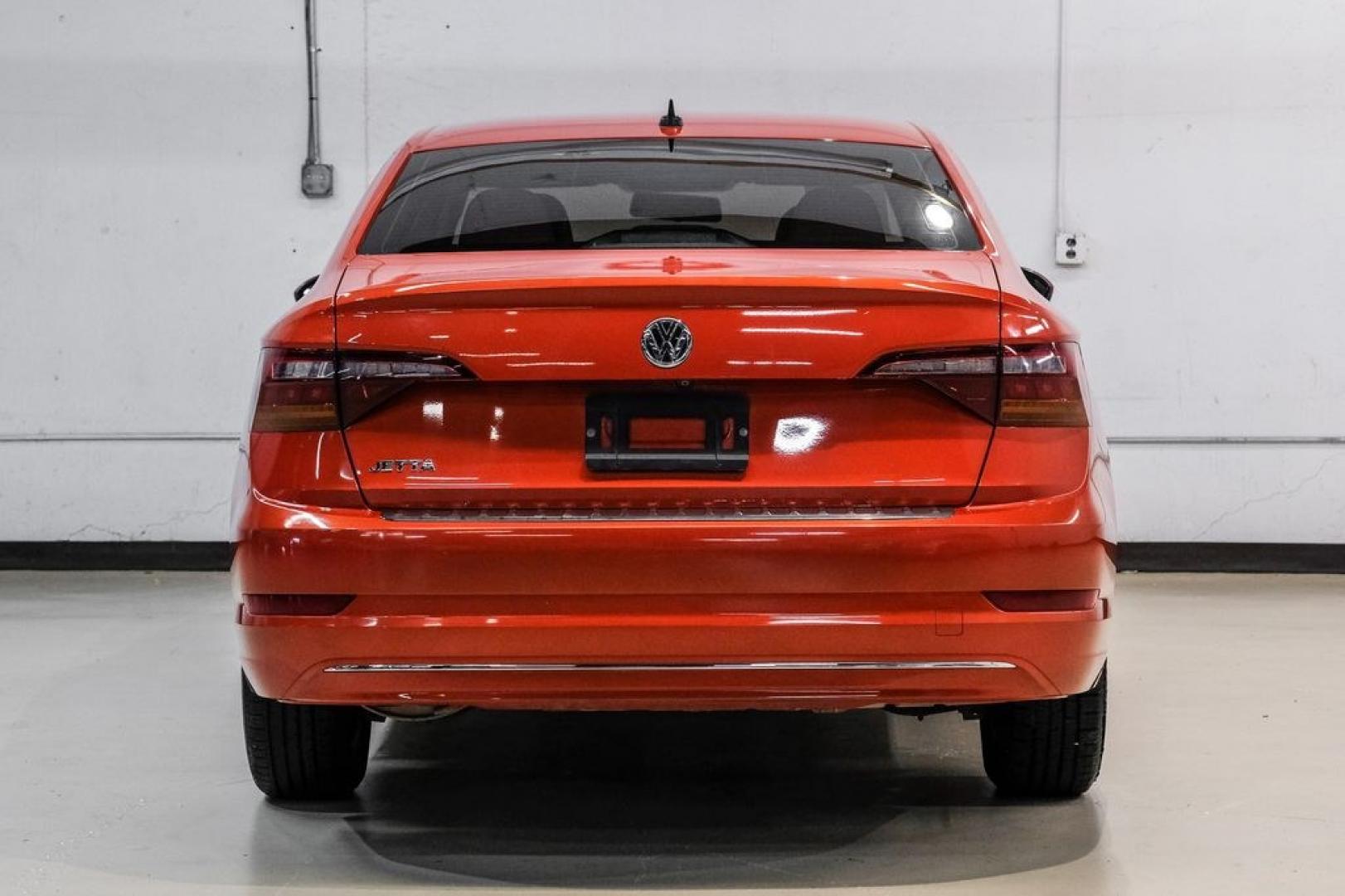 2019 Habanero Orange Metallic /Dark Beige Volkswagen Jetta 1.4T S (3VWN57BU9KM) with an 1.4L TSI engine, Manual transmission, located at 15300 Midway Rd., Addison, TX, 75001, (972) 702-0011, 32.958321, -96.838074- Photo#12