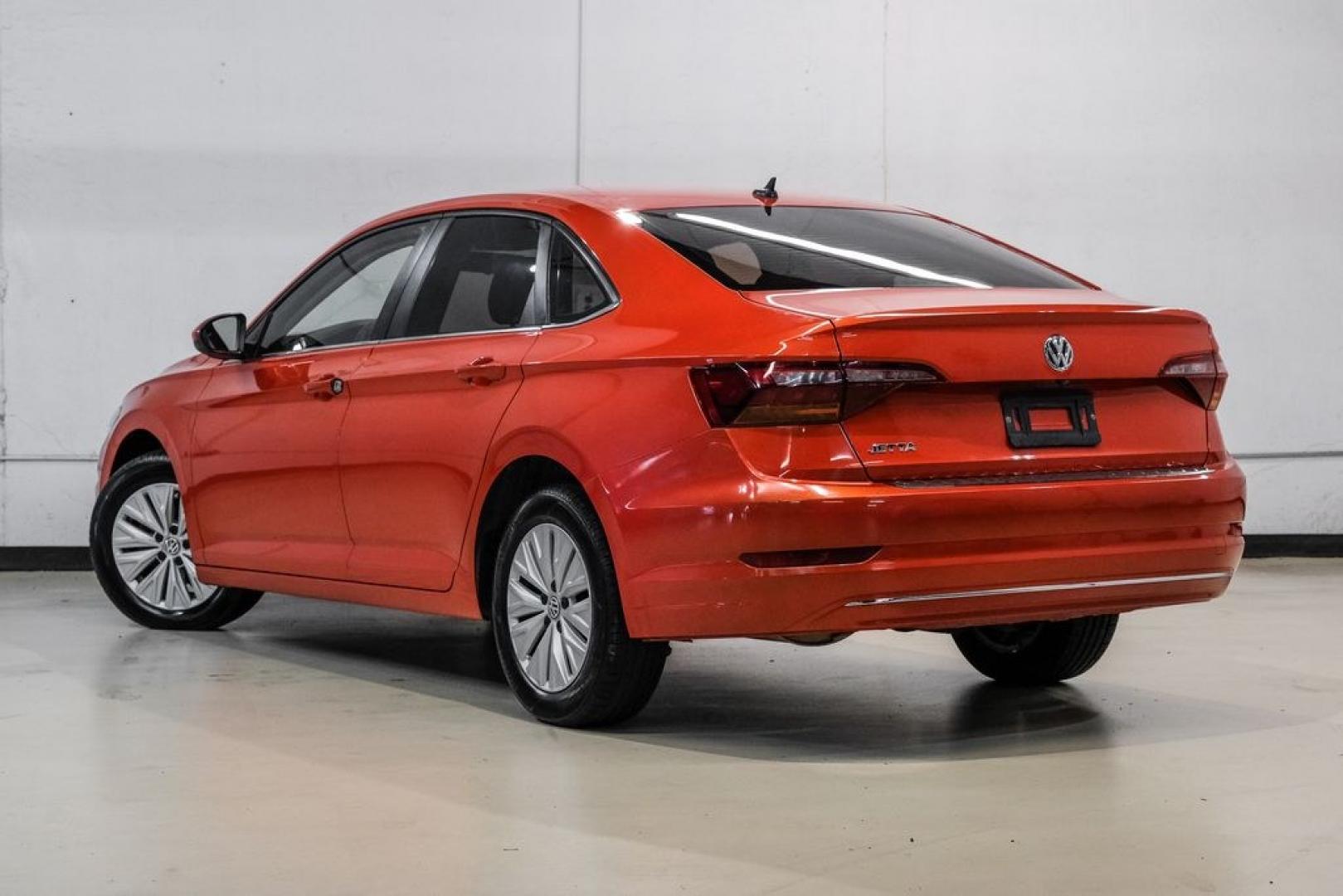 2019 Habanero Orange Metallic /Dark Beige Volkswagen Jetta 1.4T S (3VWN57BU9KM) with an 1.4L TSI engine, Manual transmission, located at 15300 Midway Rd., Addison, TX, 75001, (972) 702-0011, 32.958321, -96.838074- Photo#13