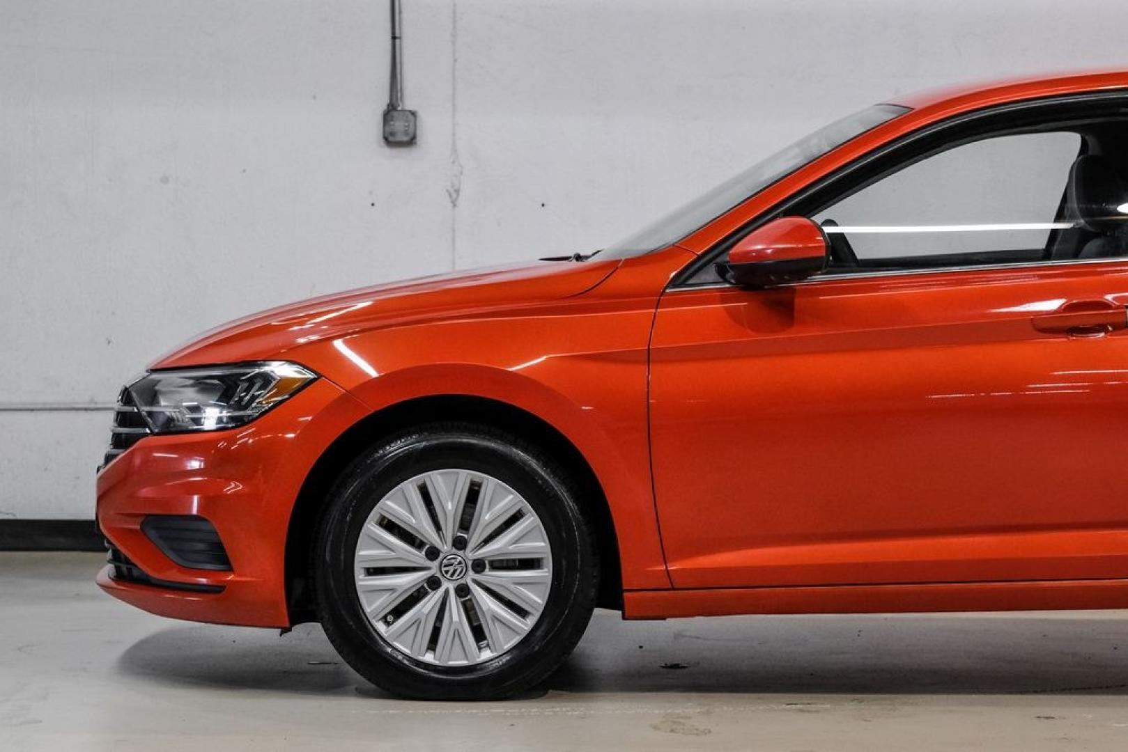 2019 Habanero Orange Metallic /Dark Beige Volkswagen Jetta 1.4T S (3VWN57BU9KM) with an 1.4L TSI engine, Manual transmission, located at 15300 Midway Rd., Addison, TX, 75001, (972) 702-0011, 32.958321, -96.838074- Photo#15