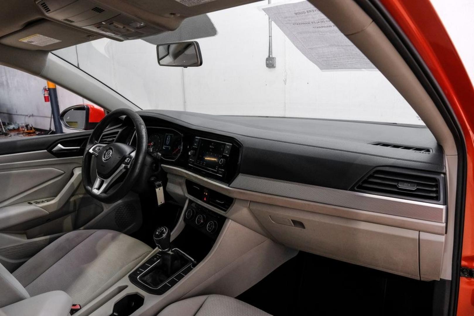 2019 Habanero Orange Metallic /Dark Beige Volkswagen Jetta 1.4T S (3VWN57BU9KM) with an 1.4L TSI engine, Manual transmission, located at 15300 Midway Rd., Addison, TX, 75001, (972) 702-0011, 32.958321, -96.838074- Photo#17