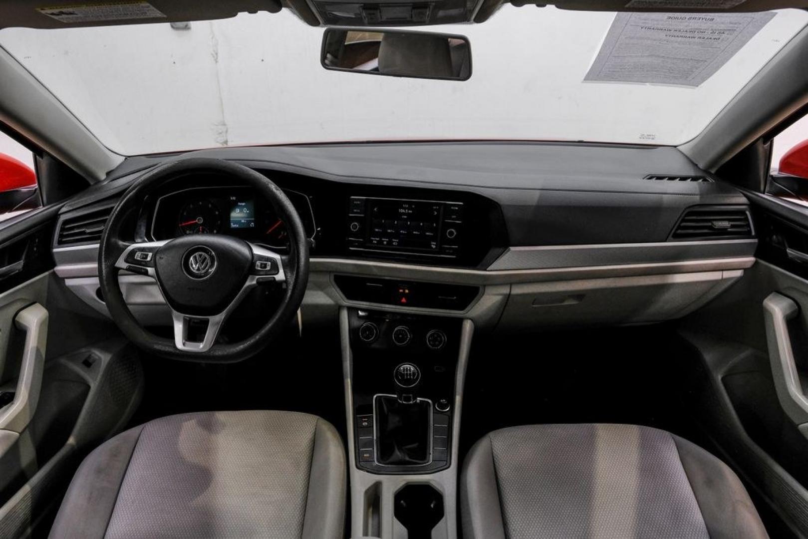 2019 Habanero Orange Metallic /Dark Beige Volkswagen Jetta 1.4T S (3VWN57BU9KM) with an 1.4L TSI engine, Manual transmission, located at 15300 Midway Rd., Addison, TX, 75001, (972) 702-0011, 32.958321, -96.838074- Photo#18