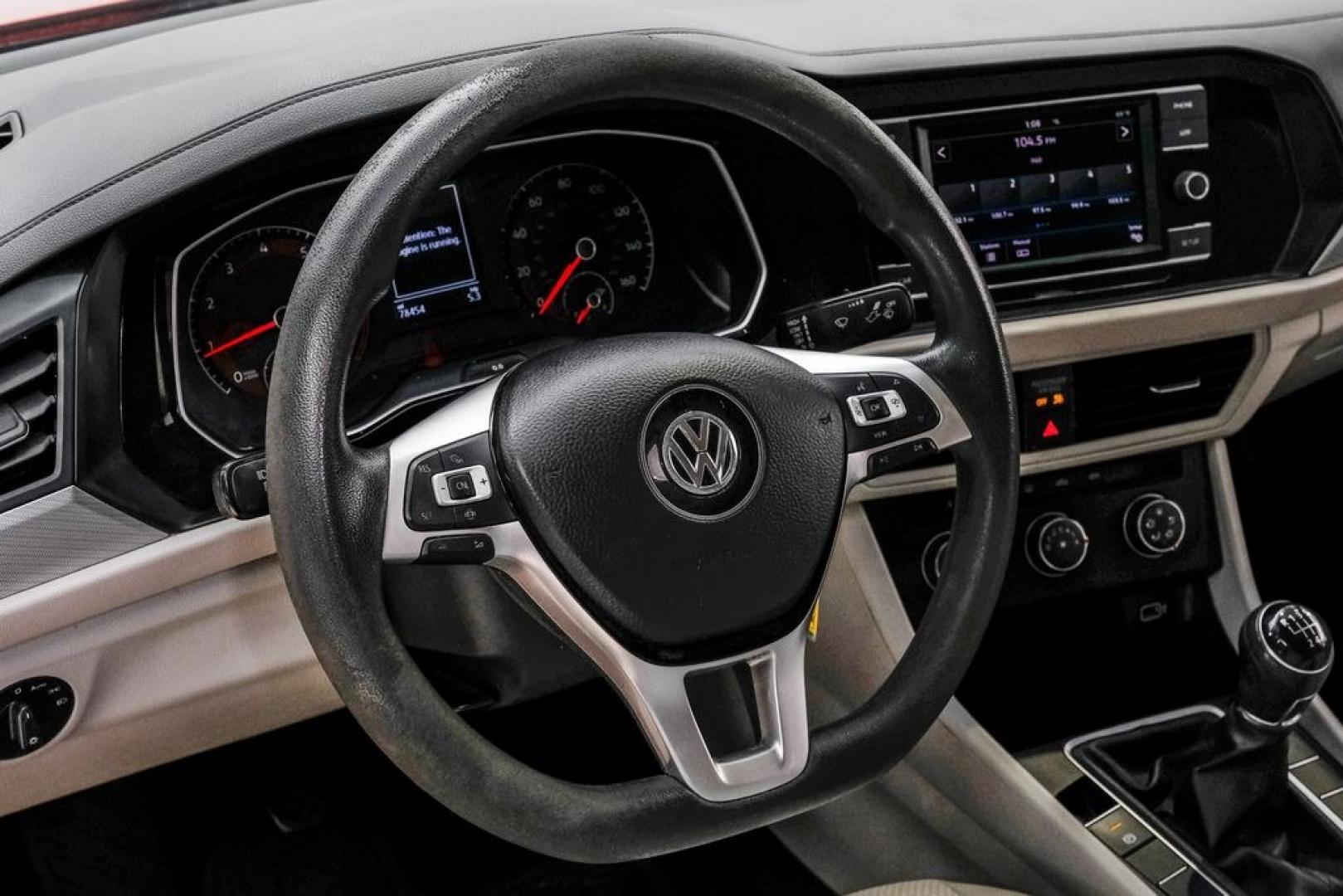 2019 Habanero Orange Metallic /Dark Beige Volkswagen Jetta 1.4T S (3VWN57BU9KM) with an 1.4L TSI engine, Manual transmission, located at 15300 Midway Rd., Addison, TX, 75001, (972) 702-0011, 32.958321, -96.838074- Photo#21