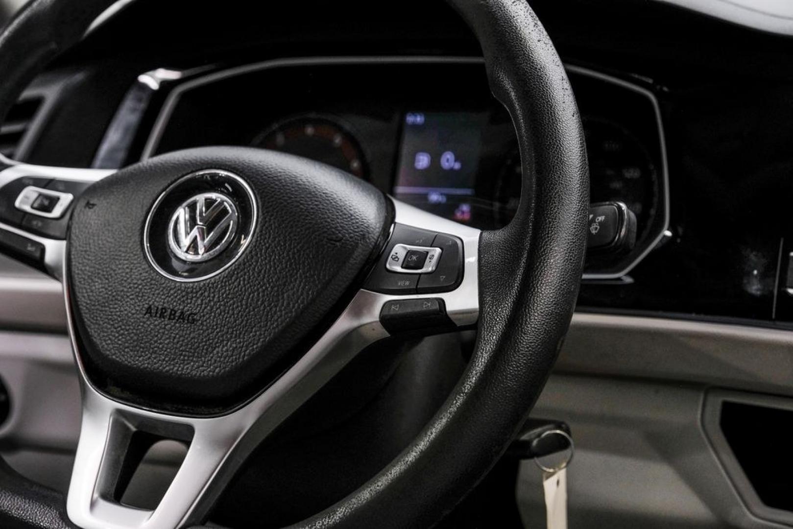 2019 Habanero Orange Metallic /Dark Beige Volkswagen Jetta 1.4T S (3VWN57BU9KM) with an 1.4L TSI engine, Manual transmission, located at 15300 Midway Rd., Addison, TX, 75001, (972) 702-0011, 32.958321, -96.838074- Photo#23