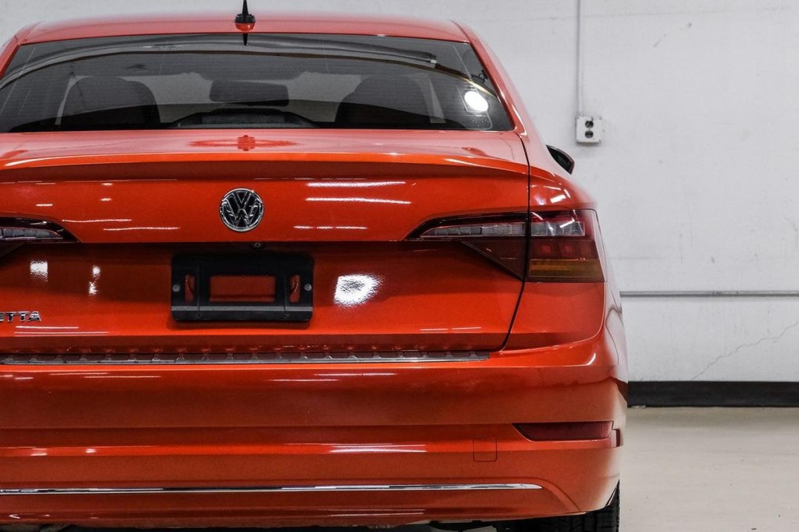 2019 Habanero Orange Metallic /Dark Beige Volkswagen Jetta 1.4T S (3VWN57BU9KM) with an 1.4L TSI engine, Manual transmission, located at 15300 Midway Rd., Addison, TX, 75001, (972) 702-0011, 32.958321, -96.838074- Photo#51