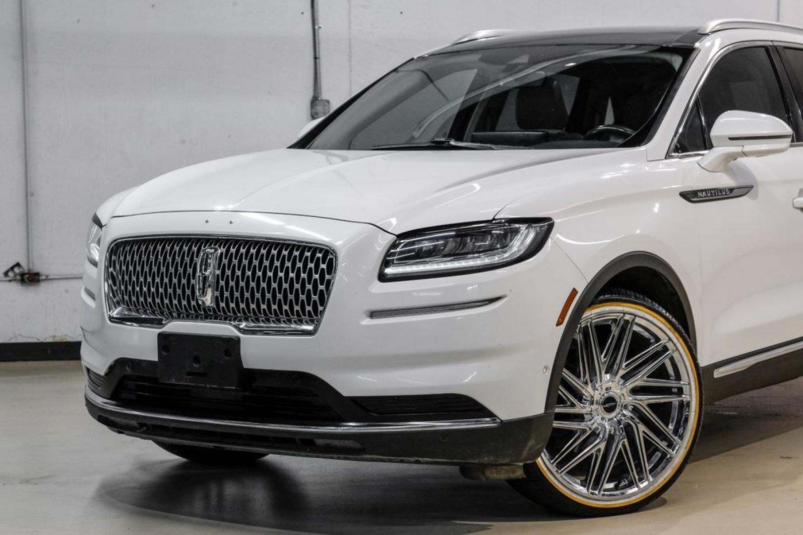 2021 White /Sandstone Lincoln Nautilus Reserve (2LMPJ6K98MB) with an 2.0L Turbocharged engine, Automatic transmission, located at 15300 Midway Rd., Addison, TX, 75001, (972) 702-0011, 32.958321, -96.838074- Photo#5
