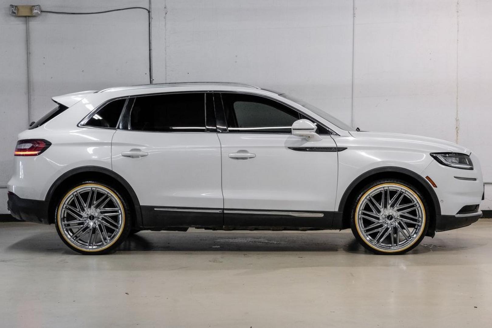 2021 White /Sandstone Lincoln Nautilus Reserve (2LMPJ6K98MB) with an 2.0L Turbocharged engine, Automatic transmission, located at 15300 Midway Rd., Addison, TX, 75001, (972) 702-0011, 32.958321, -96.838074- Photo#9