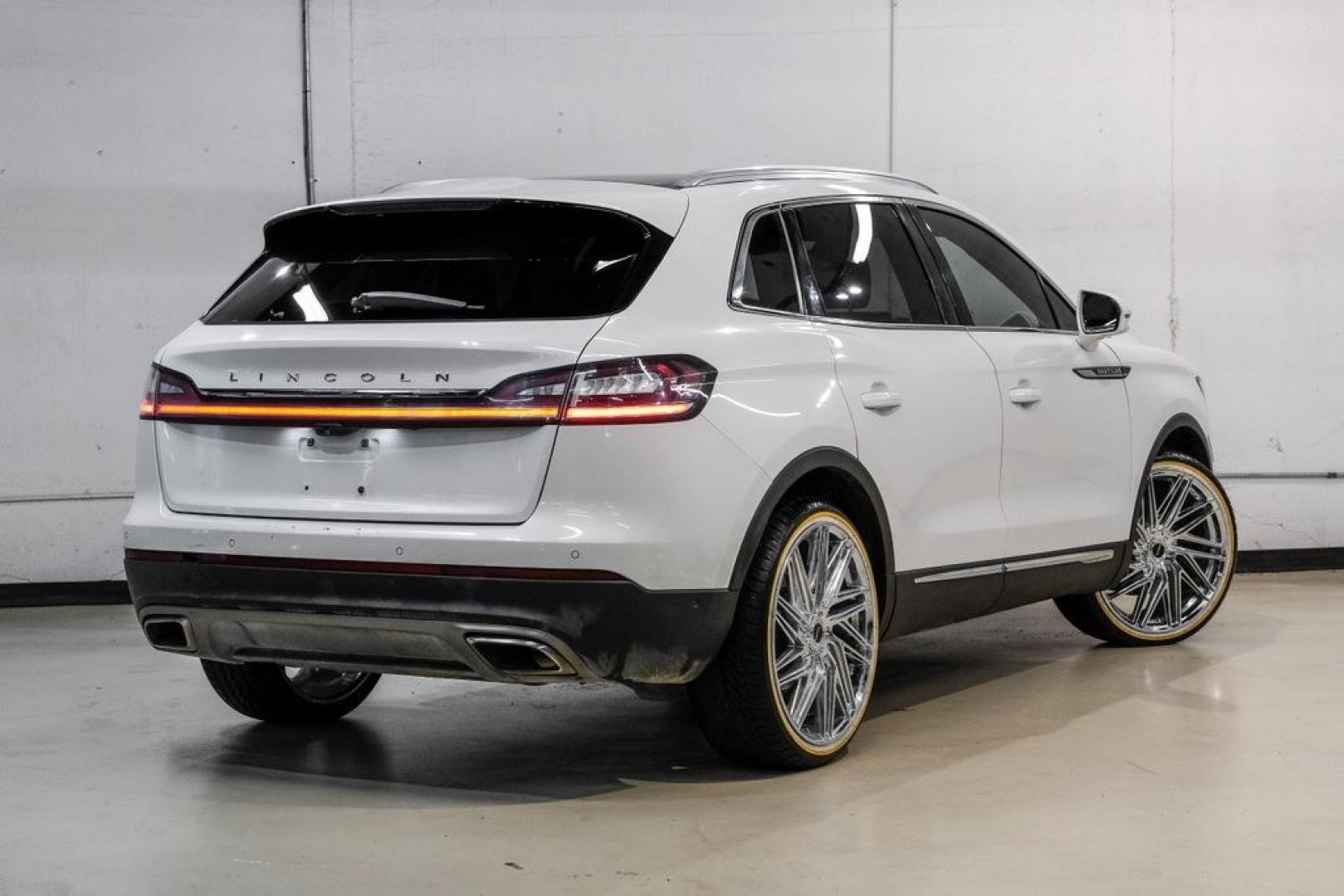 2021 White /Sandstone Lincoln Nautilus Reserve (2LMPJ6K98MB) with an 2.0L Turbocharged engine, Automatic transmission, located at 15300 Midway Rd., Addison, TX, 75001, (972) 702-0011, 32.958321, -96.838074- Photo#10