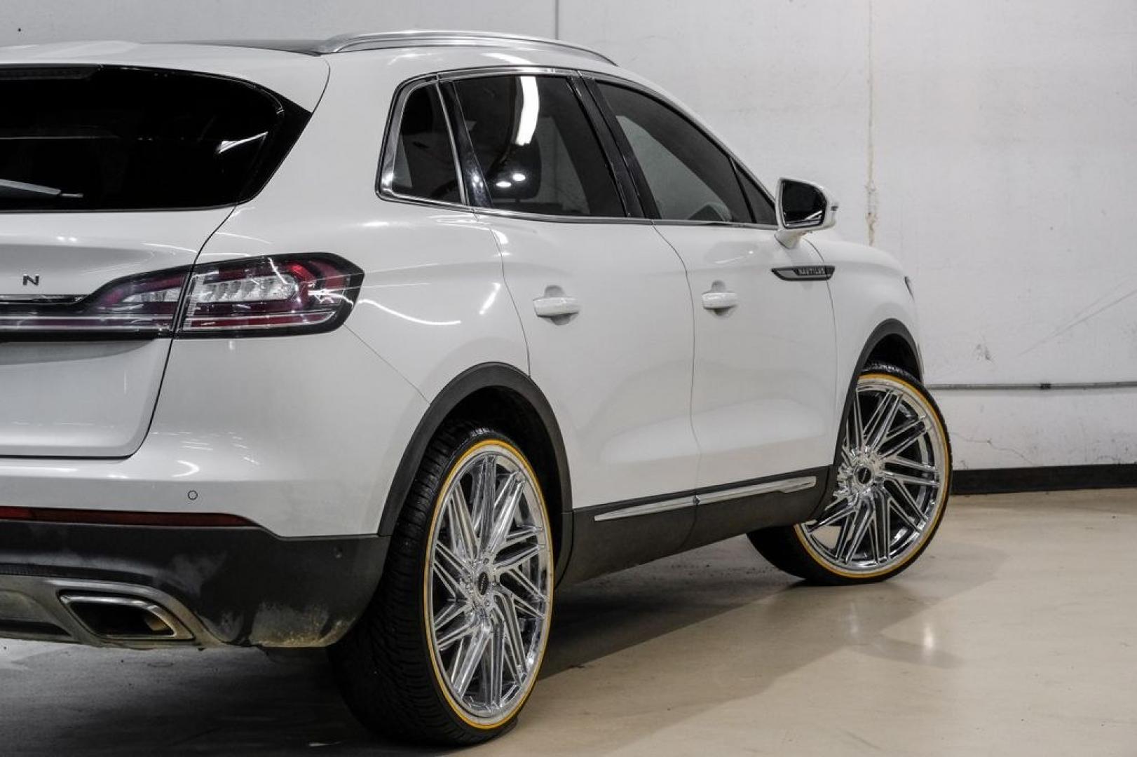 2021 White /Sandstone Lincoln Nautilus Reserve (2LMPJ6K98MB) with an 2.0L Turbocharged engine, Automatic transmission, located at 15300 Midway Rd., Addison, TX, 75001, (972) 702-0011, 32.958321, -96.838074- Photo#12