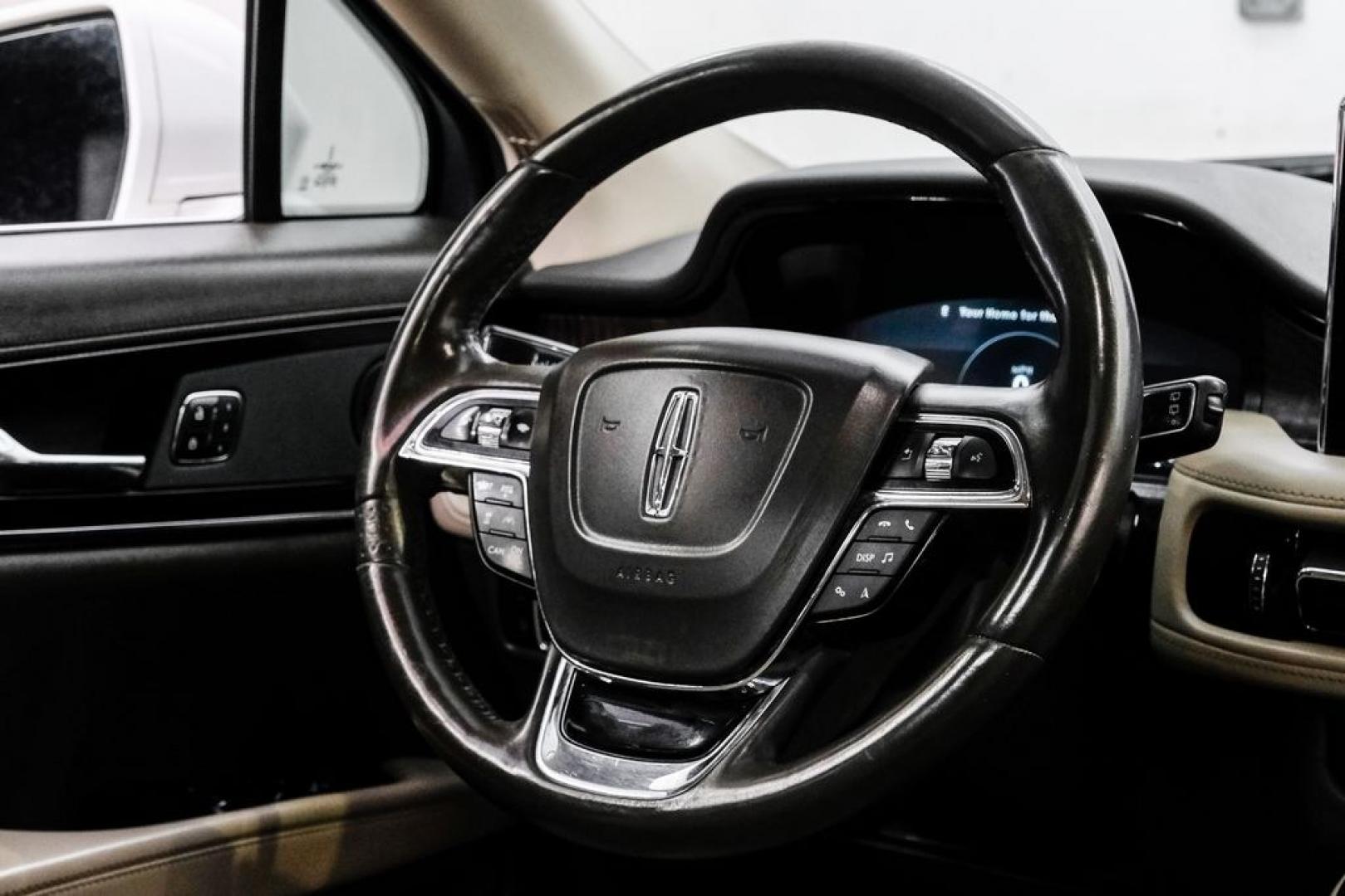 2021 White /Sandstone Lincoln Nautilus Reserve (2LMPJ6K98MB) with an 2.0L Turbocharged engine, Automatic transmission, located at 15300 Midway Rd., Addison, TX, 75001, (972) 702-0011, 32.958321, -96.838074- Photo#20