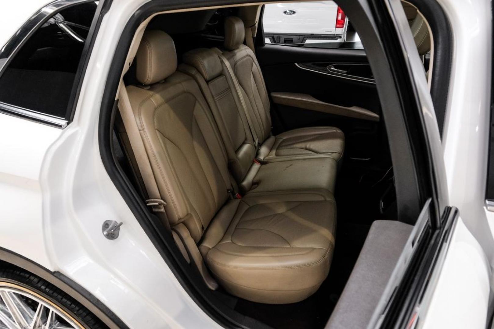 2021 White /Sandstone Lincoln Nautilus Reserve (2LMPJ6K98MB) with an 2.0L Turbocharged engine, Automatic transmission, located at 15300 Midway Rd., Addison, TX, 75001, (972) 702-0011, 32.958321, -96.838074- Photo#45