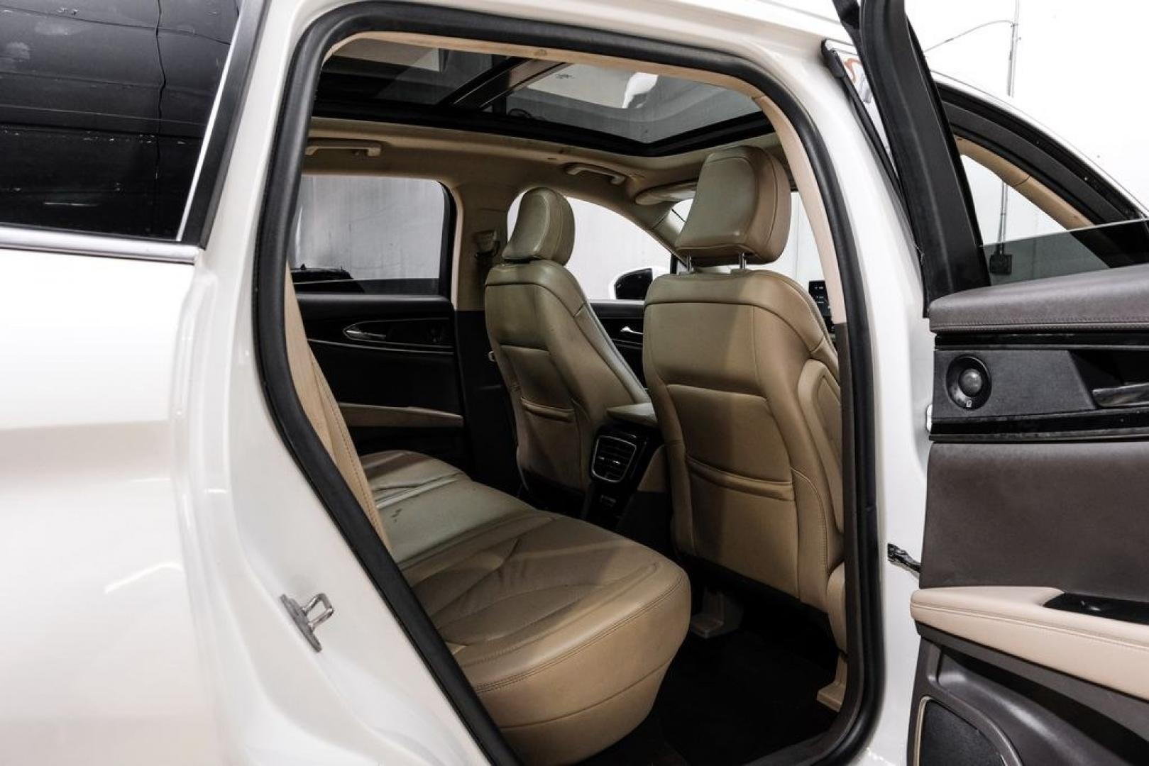 2021 White /Sandstone Lincoln Nautilus Reserve (2LMPJ6K98MB) with an 2.0L Turbocharged engine, Automatic transmission, located at 15300 Midway Rd., Addison, TX, 75001, (972) 702-0011, 32.958321, -96.838074- Photo#46