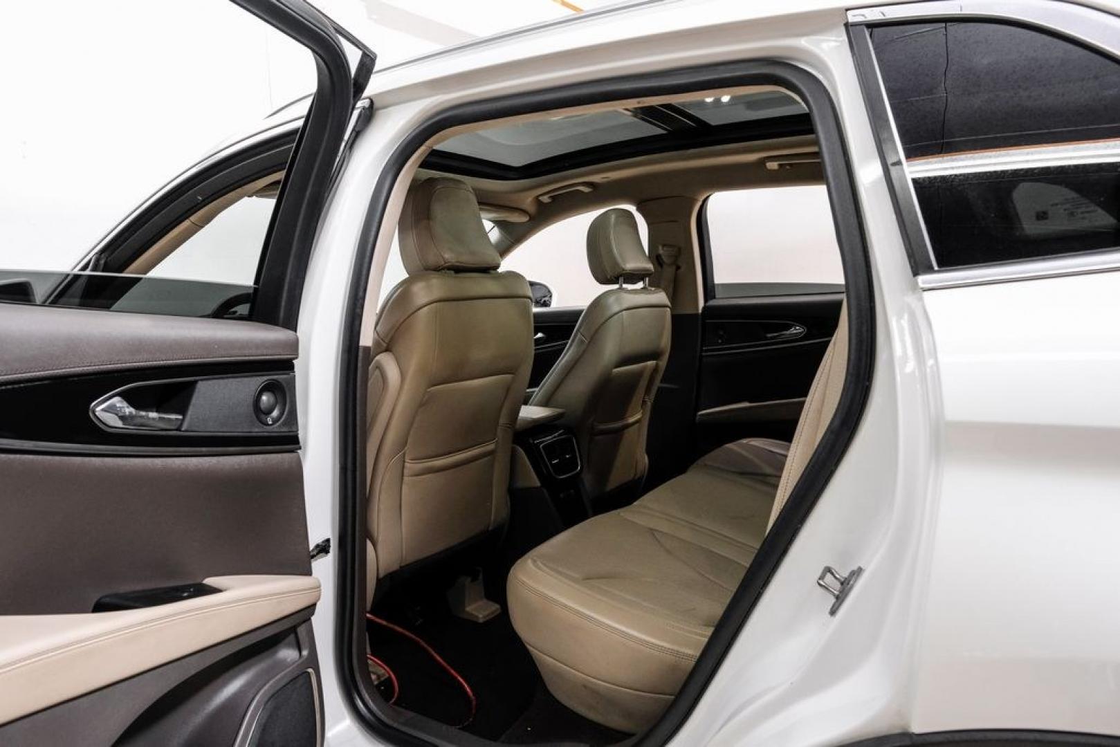 2021 White /Sandstone Lincoln Nautilus Reserve (2LMPJ6K98MB) with an 2.0L Turbocharged engine, Automatic transmission, located at 15300 Midway Rd., Addison, TX, 75001, (972) 702-0011, 32.958321, -96.838074- Photo#47