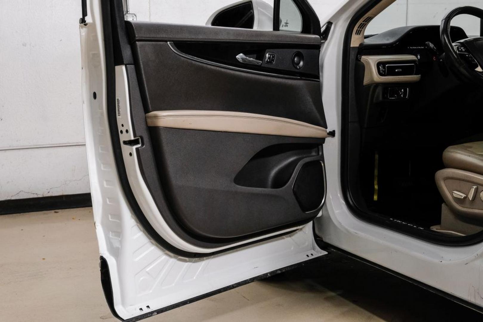 2021 White /Sandstone Lincoln Nautilus Reserve (2LMPJ6K98MB) with an 2.0L Turbocharged engine, Automatic transmission, located at 15300 Midway Rd., Addison, TX, 75001, (972) 702-0011, 32.958321, -96.838074- Photo#51