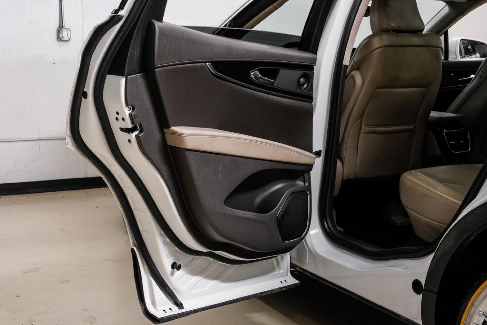 2021 White /Sandstone Lincoln Nautilus Reserve (2LMPJ6K98MB) with an 2.0L Turbocharged engine, Automatic transmission, located at 15300 Midway Rd., Addison, TX, 75001, (972) 702-0011, 32.958321, -96.838074- Photo#56