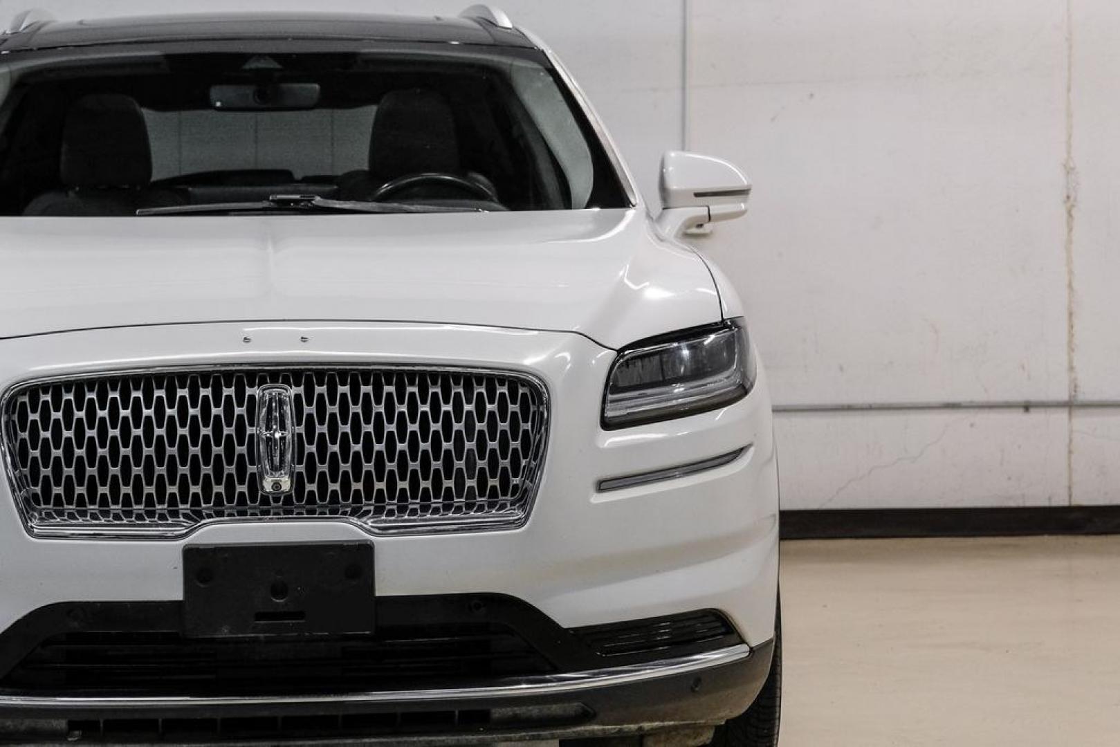2021 White /Sandstone Lincoln Nautilus Reserve (2LMPJ6K98MB) with an 2.0L Turbocharged engine, Automatic transmission, located at 15300 Midway Rd., Addison, TX, 75001, (972) 702-0011, 32.958321, -96.838074- Photo#58