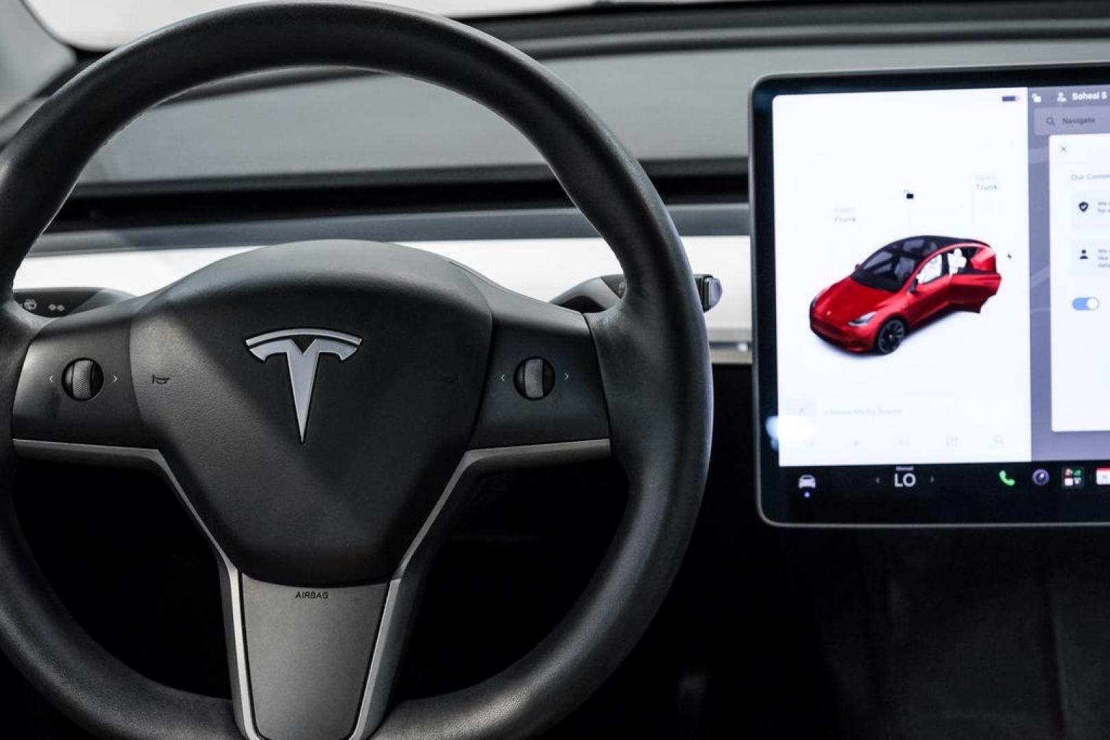 2022 Red Multi-Coat /White/Black Tesla Model Y Long Range (7SAYGDEEXNF) with an Electric Motor engine, Automatic transmission, located at 15300 Midway Rd., Addison, TX, 75001, (972) 702-0011, 32.958321, -96.838074- Photo#22