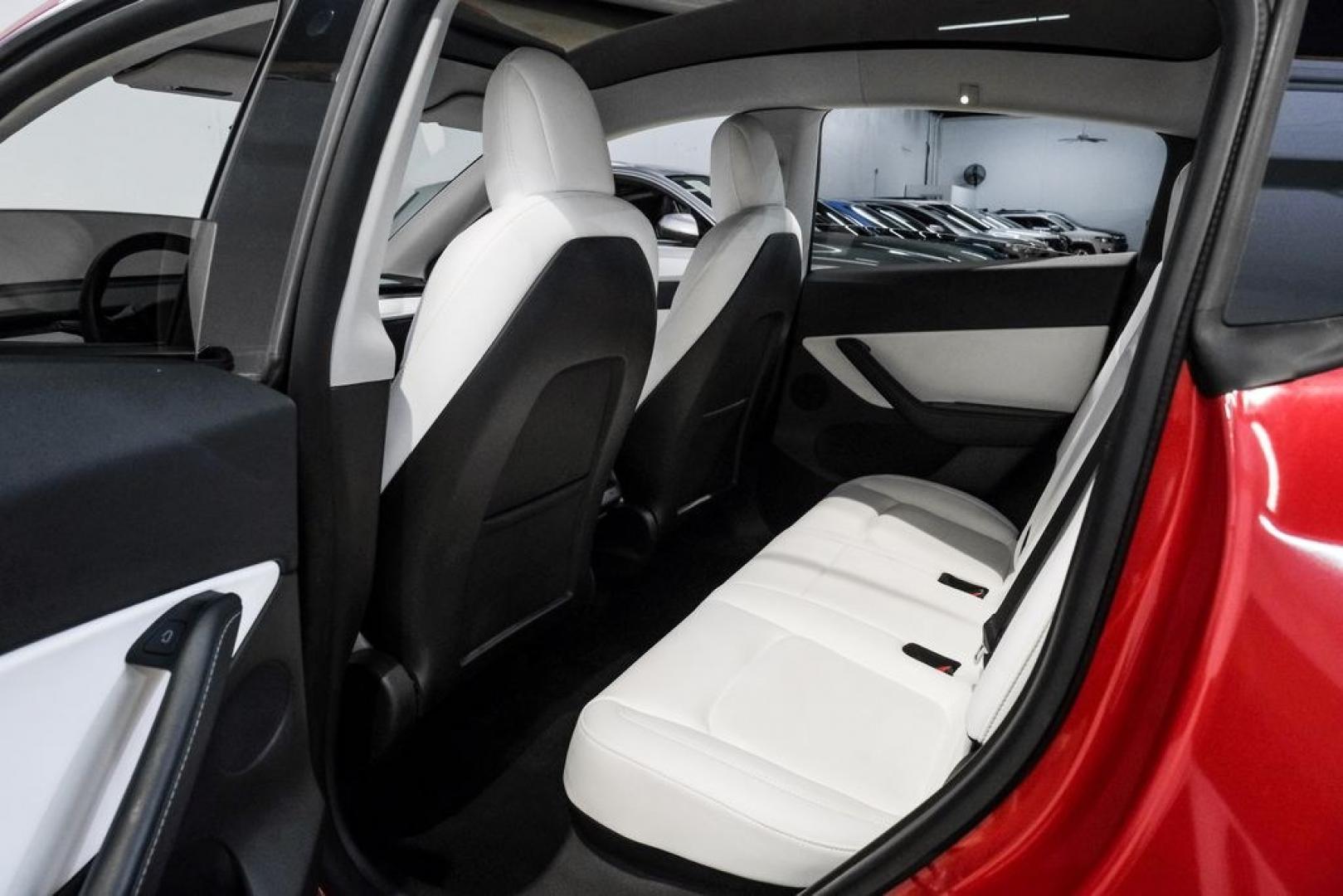 2022 Red Multi-Coat /White/Black Tesla Model Y Long Range (7SAYGDEEXNF) with an Electric Motor engine, Automatic transmission, located at 15300 Midway Rd., Addison, TX, 75001, (972) 702-0011, 32.958321, -96.838074- Photo#38