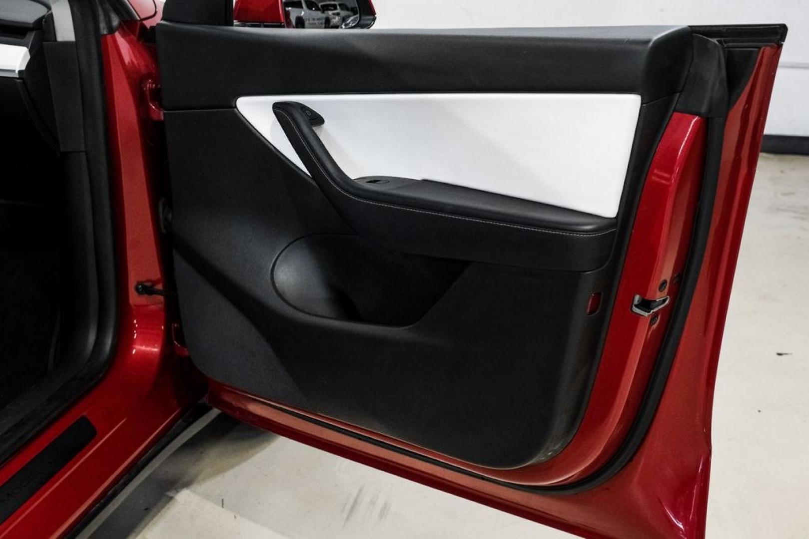 2022 Red Multi-Coat /White/Black Tesla Model Y Long Range (7SAYGDEEXNF) with an Electric Motor engine, Automatic transmission, located at 15300 Midway Rd., Addison, TX, 75001, (972) 702-0011, 32.958321, -96.838074- Photo#45