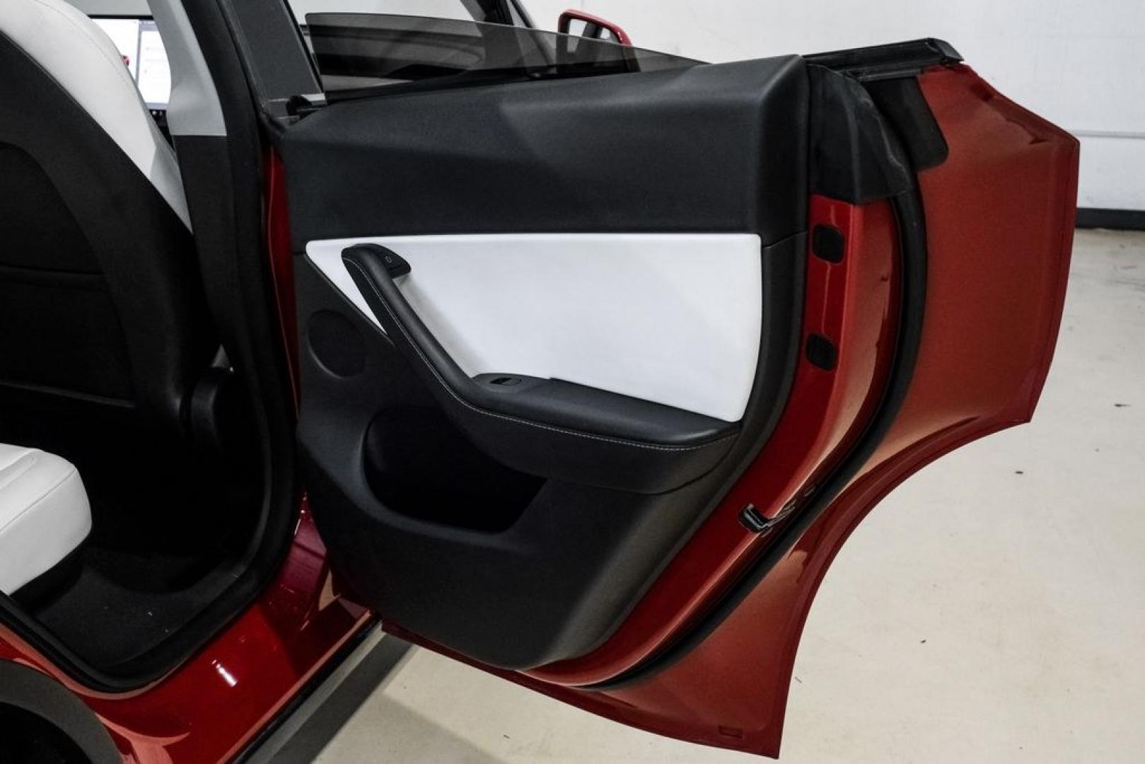 2022 Red Multi-Coat /White/Black Tesla Model Y Long Range (7SAYGDEEXNF) with an Electric Motor engine, Automatic transmission, located at 15300 Midway Rd., Addison, TX, 75001, (972) 702-0011, 32.958321, -96.838074- Photo#47