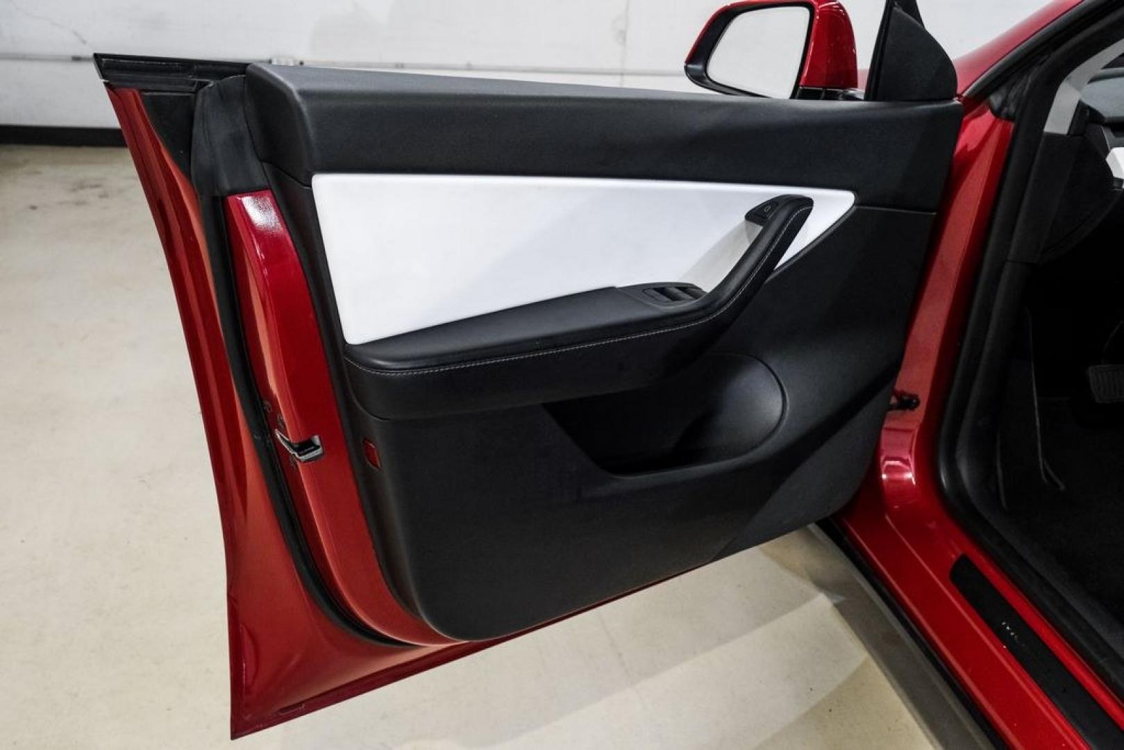 2022 Red Multi-Coat /White/Black Tesla Model Y Long Range (7SAYGDEEXNF) with an Electric Motor engine, Automatic transmission, located at 15300 Midway Rd., Addison, TX, 75001, (972) 702-0011, 32.958321, -96.838074- Photo#42