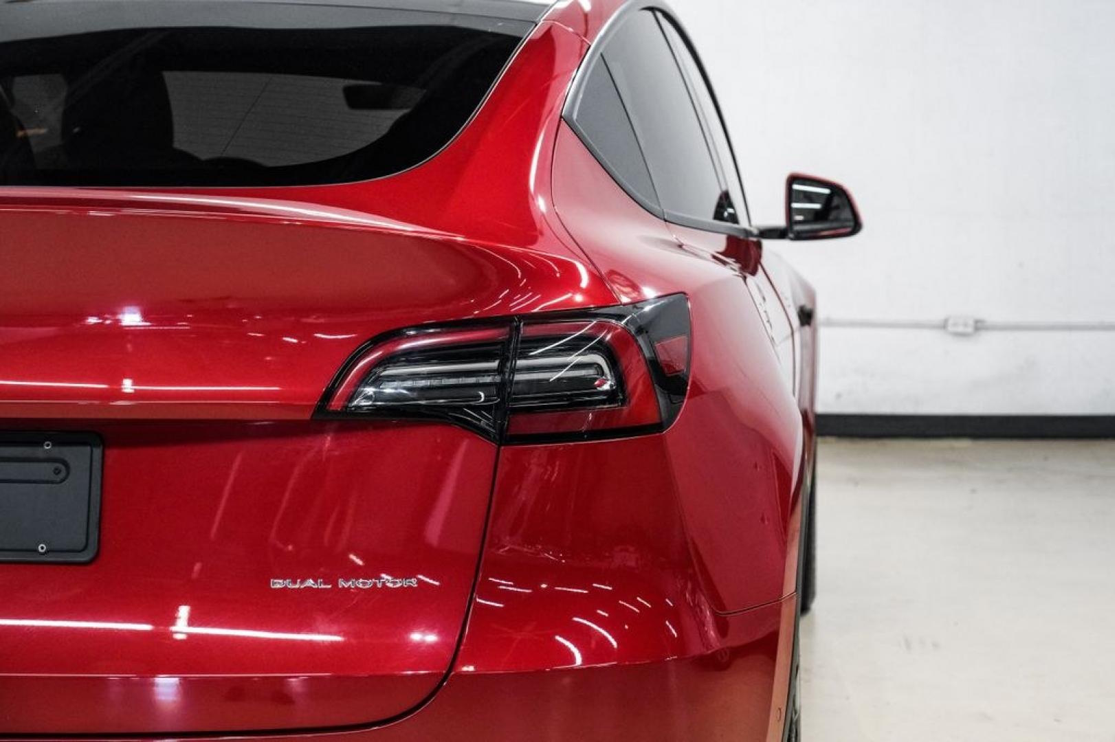 2022 Red Multi-Coat /White/Black Tesla Model Y Long Range (7SAYGDEEXNF) with an Electric Motor engine, Automatic transmission, located at 15300 Midway Rd., Addison, TX, 75001, (972) 702-0011, 32.958321, -96.838074- Photo#49