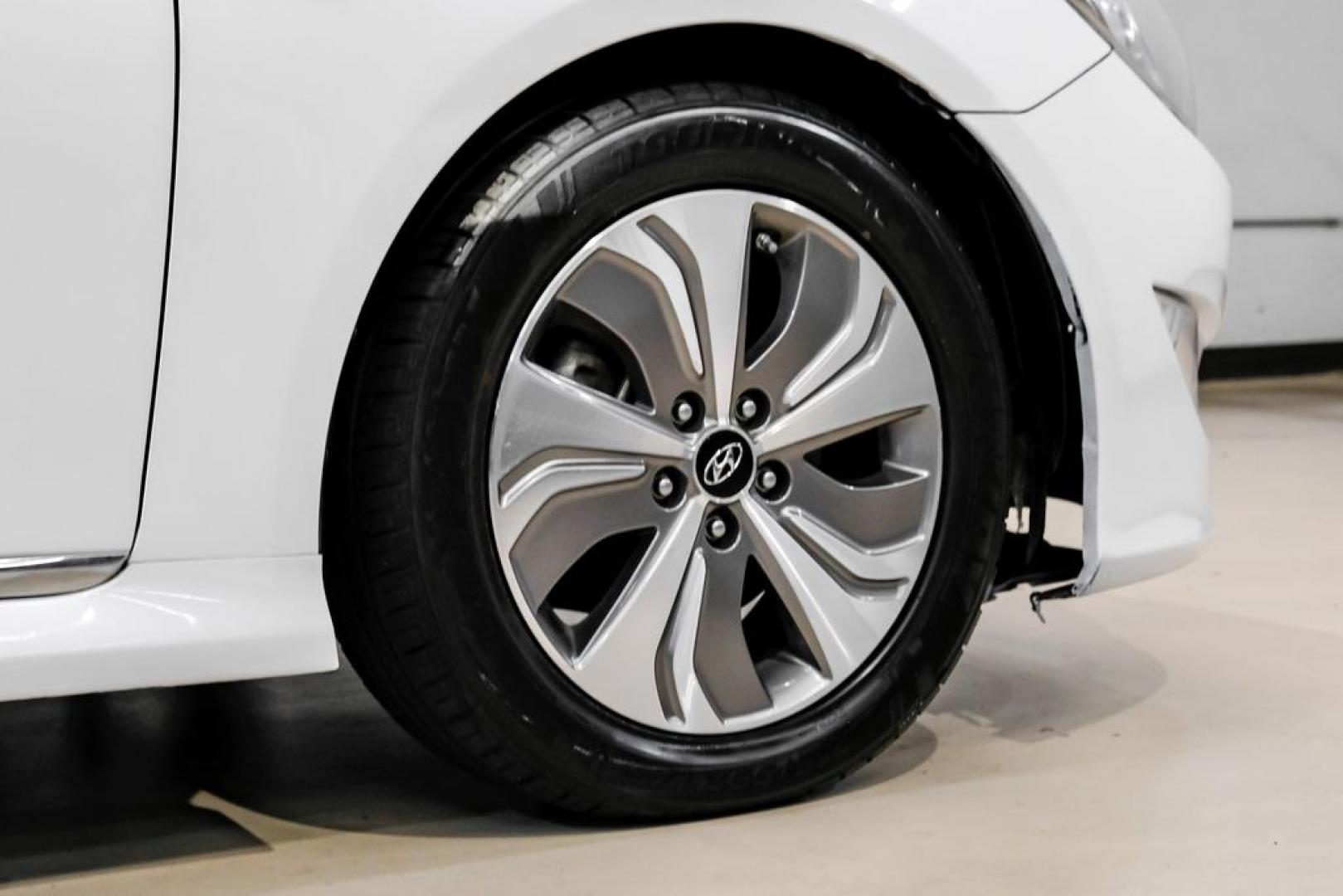 2014 Diamond White Pearl /Camel Hyundai Sonata Hybrid Limited (KMHEC4A41EA) with an 2.4L 4-Cylinder Atkinson-Cycle Hybrid engine, Automatic transmission, located at 15300 Midway Rd., Addison, TX, 75001, (972) 702-0011, 32.958321, -96.838074- Photo#59