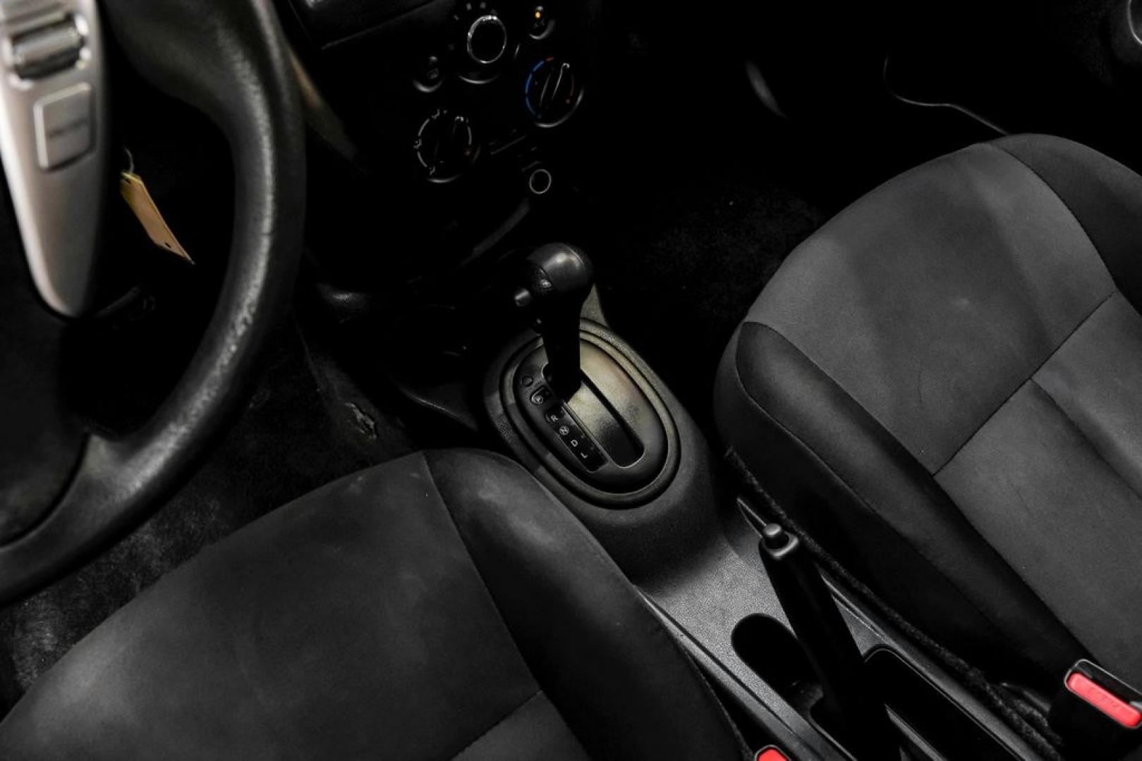 2018 Fresh Powder /Charcoal Nissan Versa 1.6 S Plus (3N1CN7AP8JL) with an 1.6L 4-Cylinder DOHC 16V engine, CVT transmission, located at 15300 Midway Rd., Addison, TX, 75001, (972) 702-0011, 32.958321, -96.838074- Photo#26