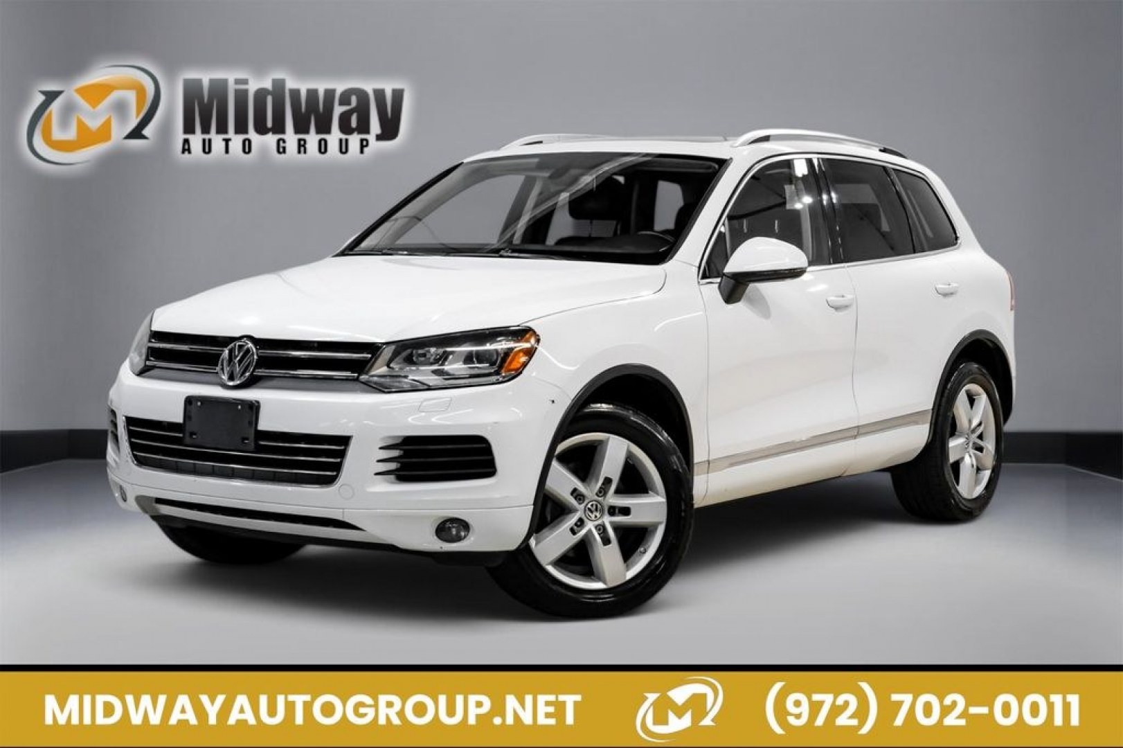 2014 Pure White /Saddle Brown Volkswagen Touareg 3.6L (WVGEF9BPXED) with an 3.6L V6 DOHC engine, Automatic transmission, located at 15300 Midway Rd., Addison, TX, 75001, (972) 702-0011, 32.958321, -96.838074- Photo#0