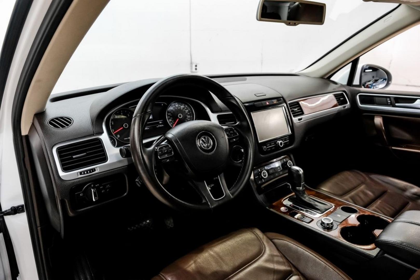 2014 Pure White /Saddle Brown Volkswagen Touareg 3.6L (WVGEF9BPXED) with an 3.6L V6 DOHC engine, Automatic transmission, located at 15300 Midway Rd., Addison, TX, 75001, (972) 702-0011, 32.958321, -96.838074- Photo#2