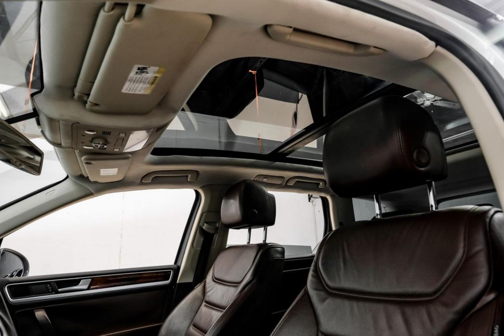 2014 Pure White /Saddle Brown Volkswagen Touareg 3.6L (WVGEF9BPXED) with an 3.6L V6 DOHC engine, Automatic transmission, located at 15300 Midway Rd., Addison, TX, 75001, (972) 702-0011, 32.958321, -96.838074- Photo#4