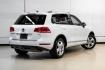 2014 Pure White /Saddle Brown Volkswagen Touareg 3.6L (WVGEF9BPXED) with an 3.6L V6 DOHC engine, Automatic transmission, located at 15300 Midway Rd., Addison, TX, 75001, (972) 702-0011, 32.958321, -96.838074- Photo#10
