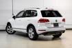 2014 Pure White /Saddle Brown Volkswagen Touareg 3.6L (WVGEF9BPXED) with an 3.6L V6 DOHC engine, Automatic transmission, located at 15300 Midway Rd., Addison, TX, 75001, (972) 702-0011, 32.958321, -96.838074- Photo#14