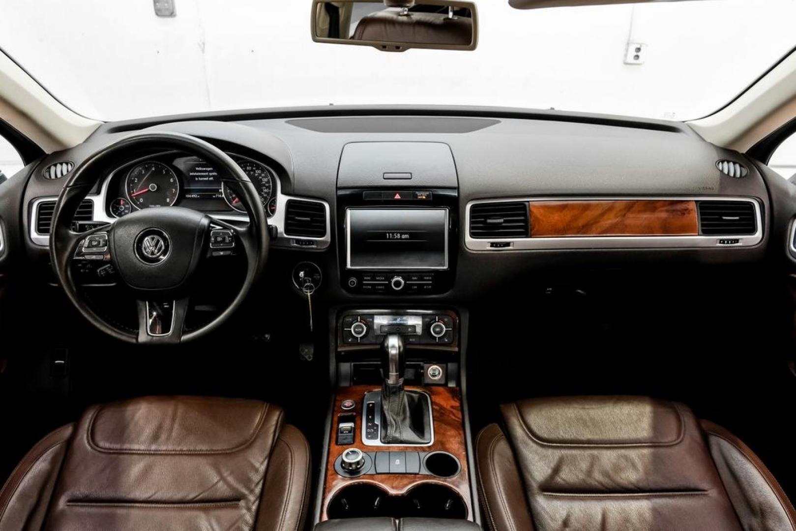 2014 Pure White /Saddle Brown Volkswagen Touareg 3.6L (WVGEF9BPXED) with an 3.6L V6 DOHC engine, Automatic transmission, located at 15300 Midway Rd., Addison, TX, 75001, (972) 702-0011, 32.958321, -96.838074- Photo#19