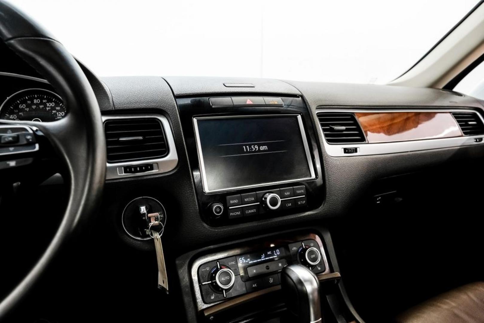 2014 Pure White /Saddle Brown Volkswagen Touareg 3.6L (WVGEF9BPXED) with an 3.6L V6 DOHC engine, Automatic transmission, located at 15300 Midway Rd., Addison, TX, 75001, (972) 702-0011, 32.958321, -96.838074- Photo#29