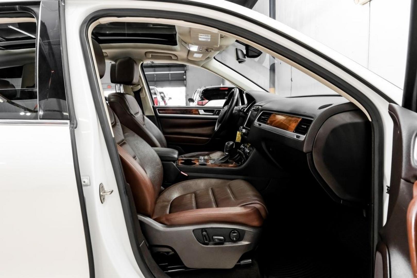 2014 Pure White /Saddle Brown Volkswagen Touareg 3.6L (WVGEF9BPXED) with an 3.6L V6 DOHC engine, Automatic transmission, located at 15300 Midway Rd., Addison, TX, 75001, (972) 702-0011, 32.958321, -96.838074- Photo#39
