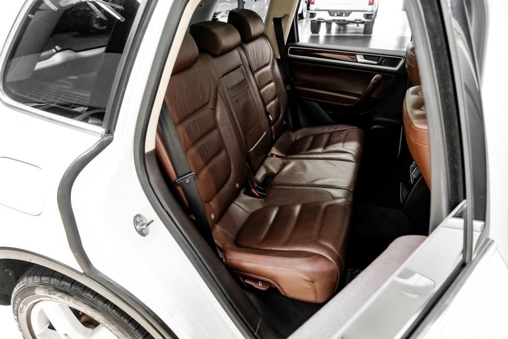 2014 Pure White /Saddle Brown Volkswagen Touareg 3.6L (WVGEF9BPXED) with an 3.6L V6 DOHC engine, Automatic transmission, located at 15300 Midway Rd., Addison, TX, 75001, (972) 702-0011, 32.958321, -96.838074- Photo#42