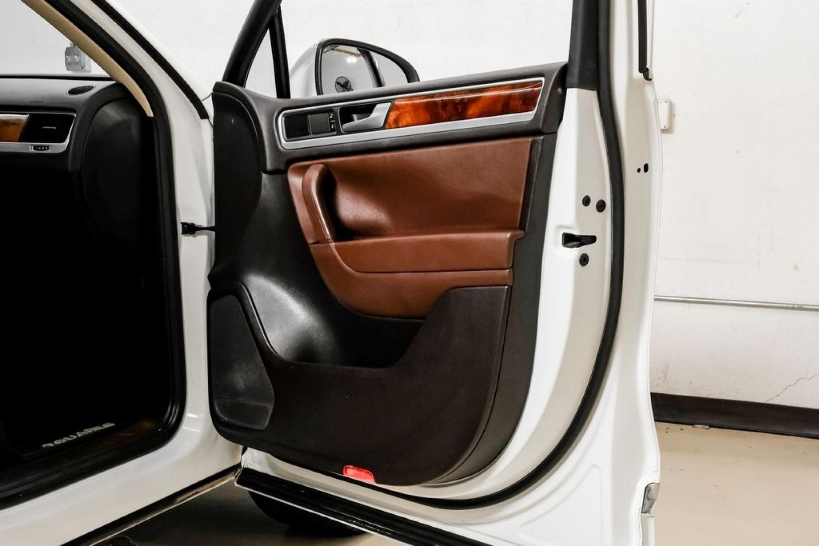 2014 Pure White /Saddle Brown Volkswagen Touareg 3.6L (WVGEF9BPXED) with an 3.6L V6 DOHC engine, Automatic transmission, located at 15300 Midway Rd., Addison, TX, 75001, (972) 702-0011, 32.958321, -96.838074- Photo#51