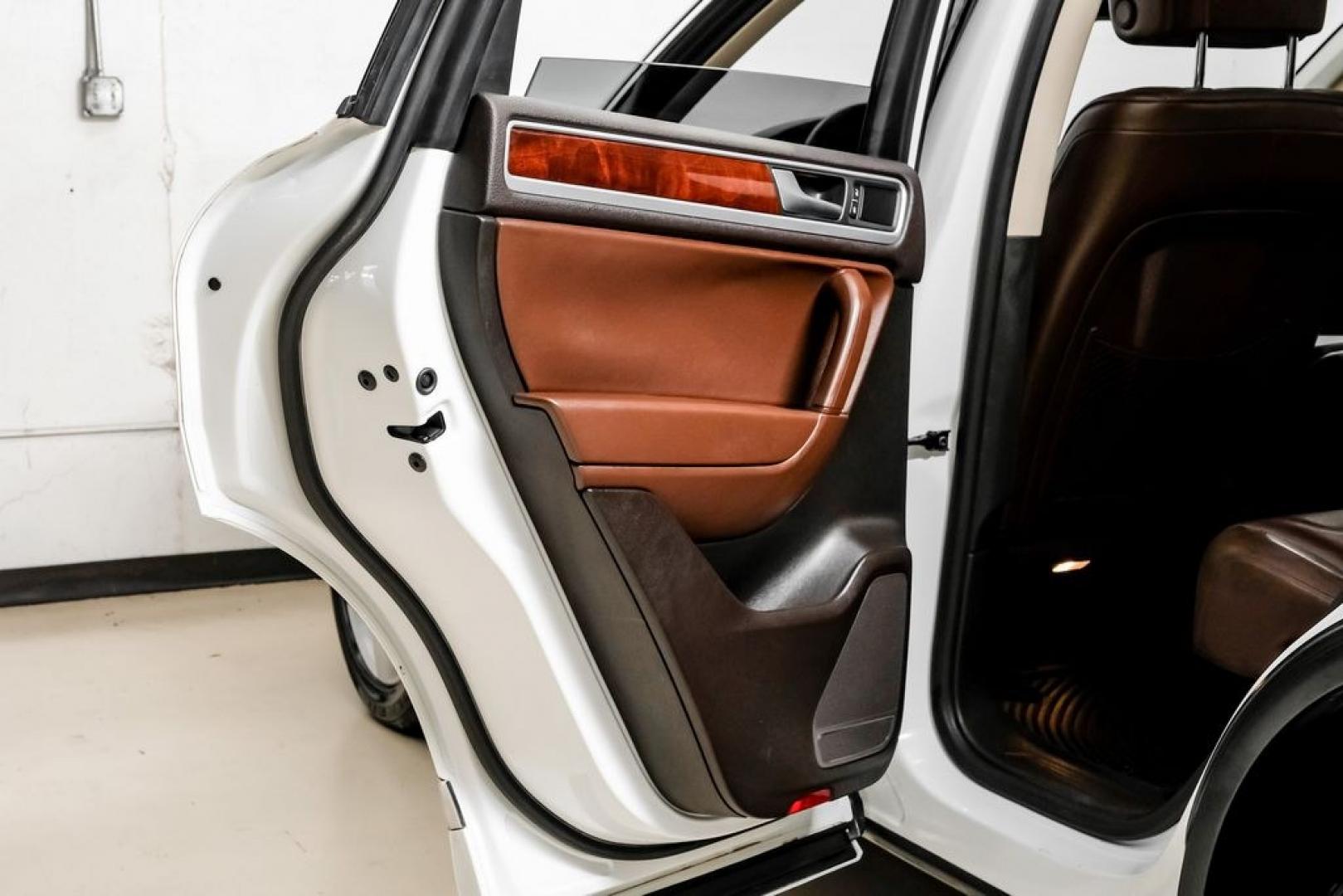 2014 Pure White /Saddle Brown Volkswagen Touareg 3.6L (WVGEF9BPXED) with an 3.6L V6 DOHC engine, Automatic transmission, located at 15300 Midway Rd., Addison, TX, 75001, (972) 702-0011, 32.958321, -96.838074- Photo#52