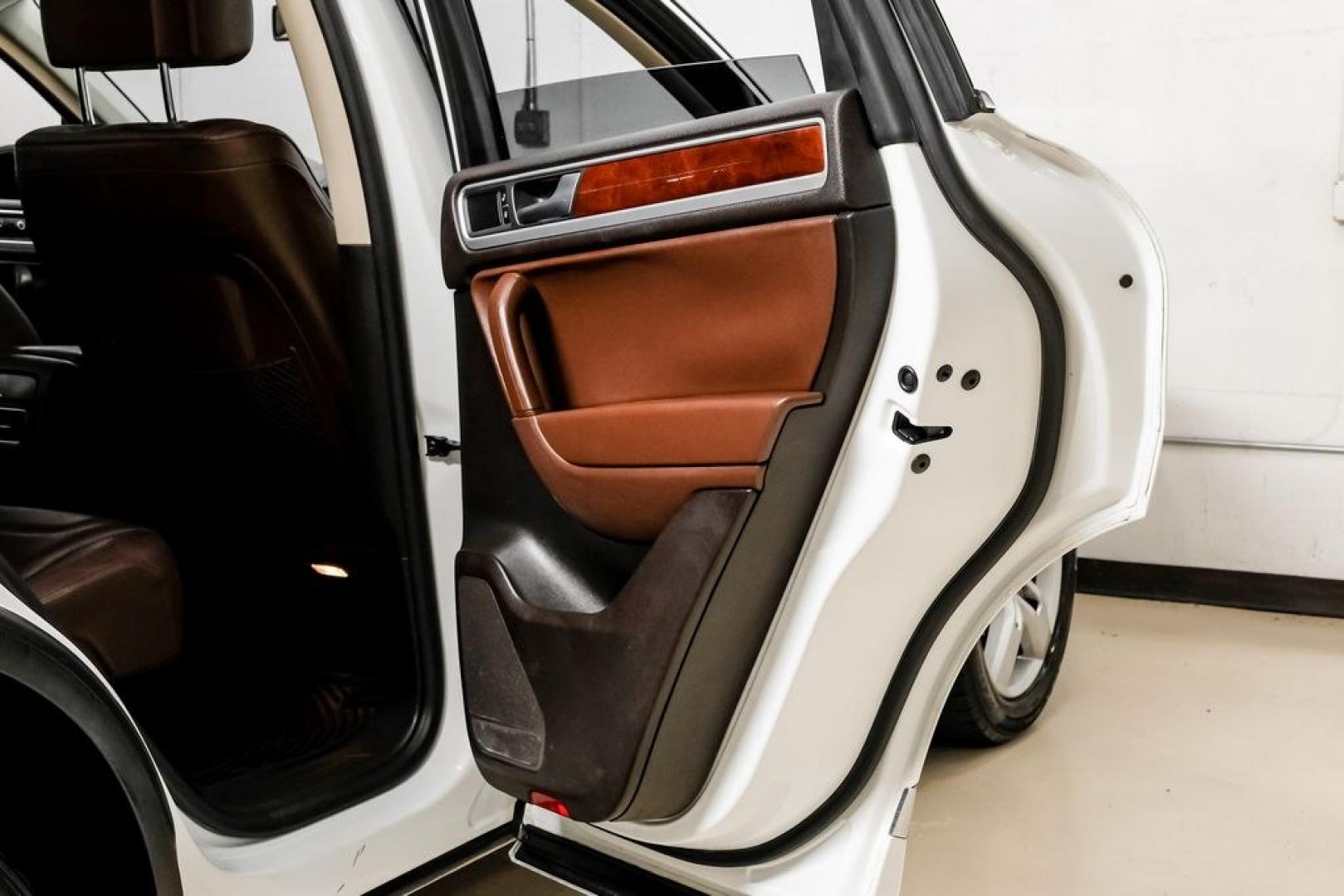 2014 Pure White /Saddle Brown Volkswagen Touareg 3.6L (WVGEF9BPXED) with an 3.6L V6 DOHC engine, Automatic transmission, located at 15300 Midway Rd., Addison, TX, 75001, (972) 702-0011, 32.958321, -96.838074- Photo#53